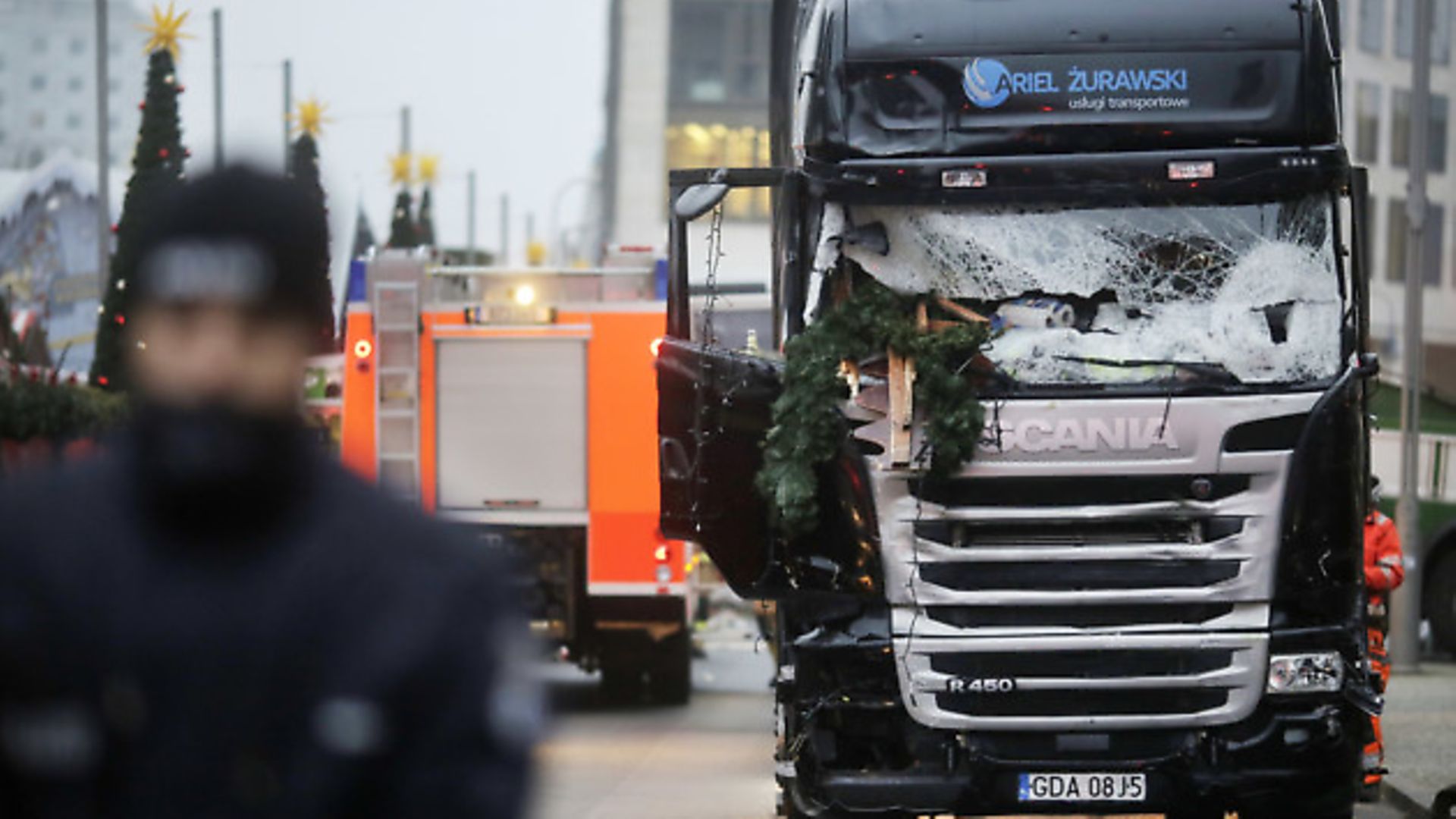 A truck which ran into a crowded Christmas market Monday evening killing several people Monday evening is seen in Berlin, Germany, Tuesday, Dec. 20, 2016.(AP Photo/Markus Schreiber) - Credit: AP/Press Association Images