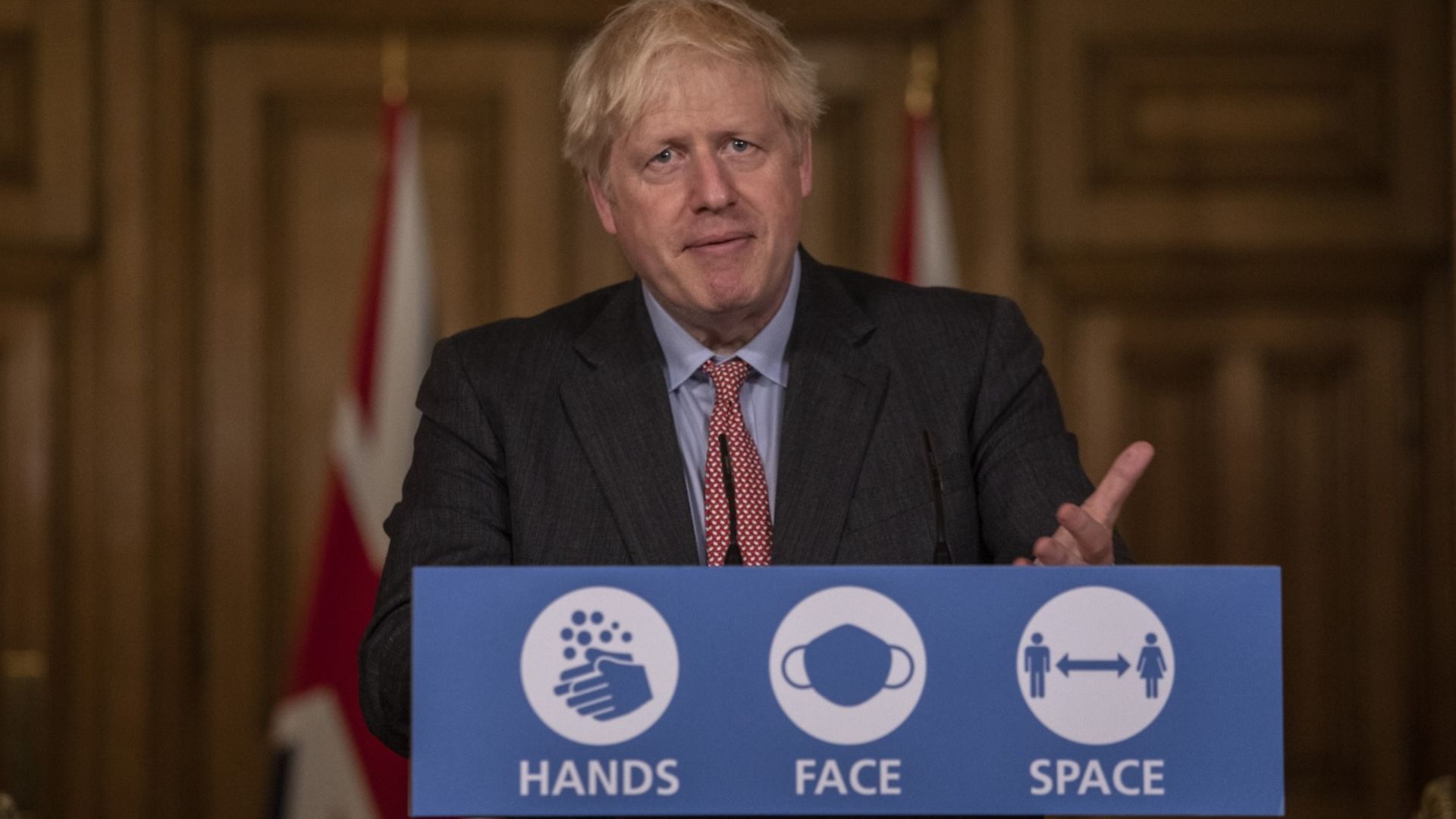 Boris Johnson stands behind the podium at 10 Downing Street - Credit: PA Wire