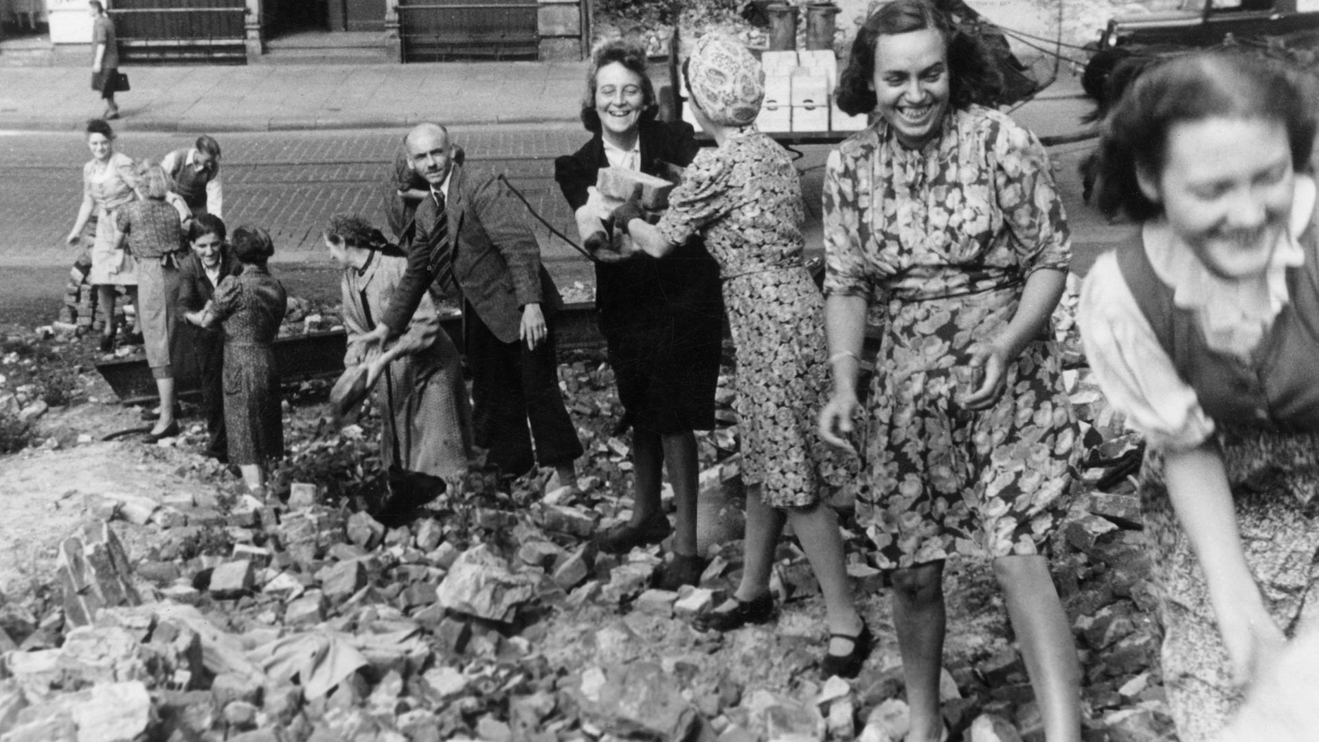 Trümmerfrauen - literally 'rubble' women - at work as Germany's post-war rebuilding operation begins - Credit: Getty Images