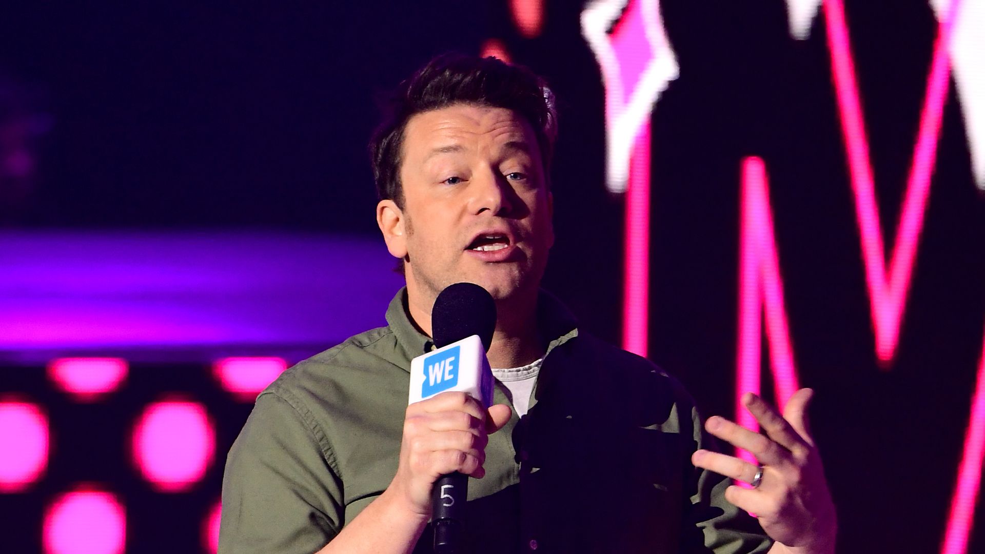 Jamie Oliver on stage at the WE Day UK charity event and concert held at The SSE Arena, Arena Square, London. - Credit: PA