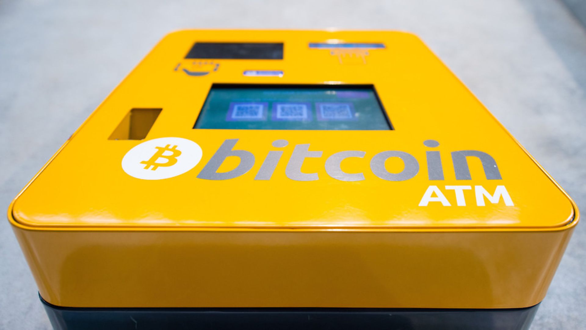 A bitcoin ATM. Each bitcoin is now worth nearly ,000. Picture: Dominic Lipinski/PA Wire - Credit: PA Archive/PA Images