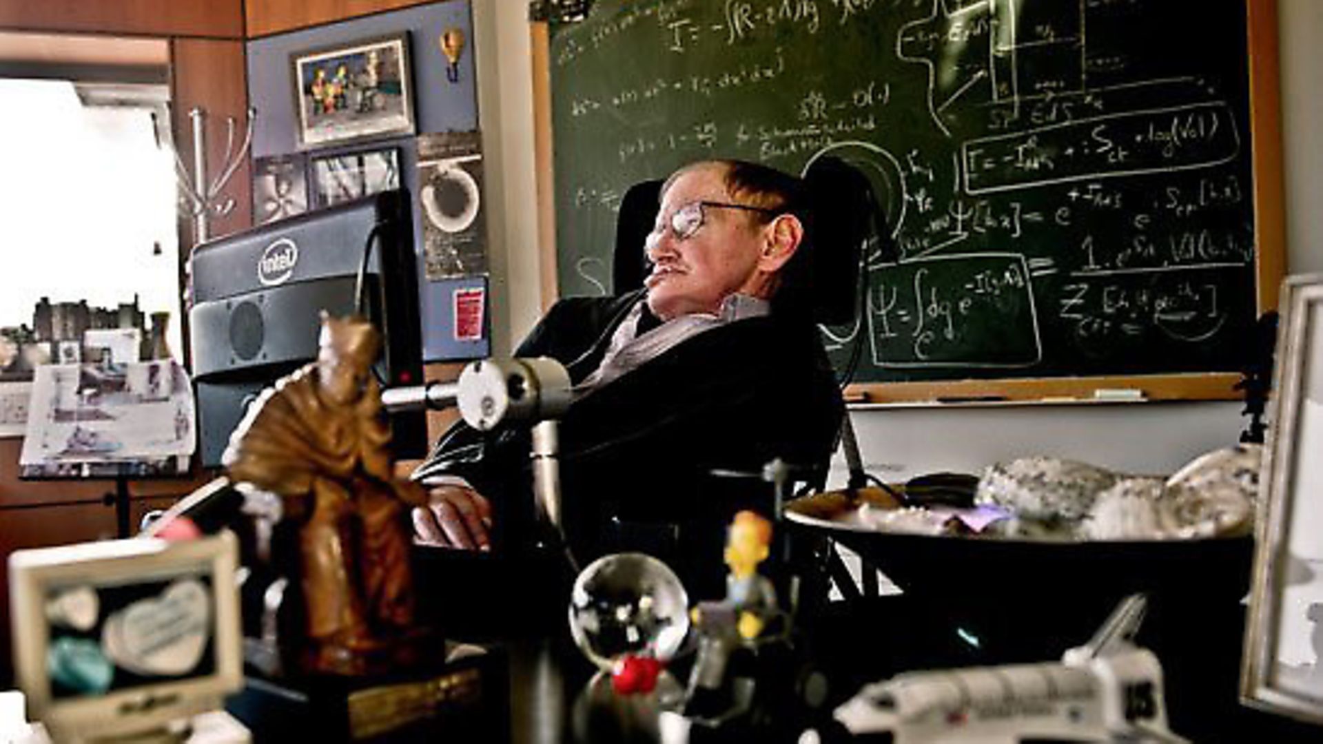 Science Museums photograph of Professor Stephen Hawking in his office at University of Cambridge, where he is director of research for the Department of Applied Mathematics and Theoretical Physics and founder of the Centre for Theoretical Cosmology. Science Museum/Sarah Lee. - Credit: Science Museum / Sarah Lee