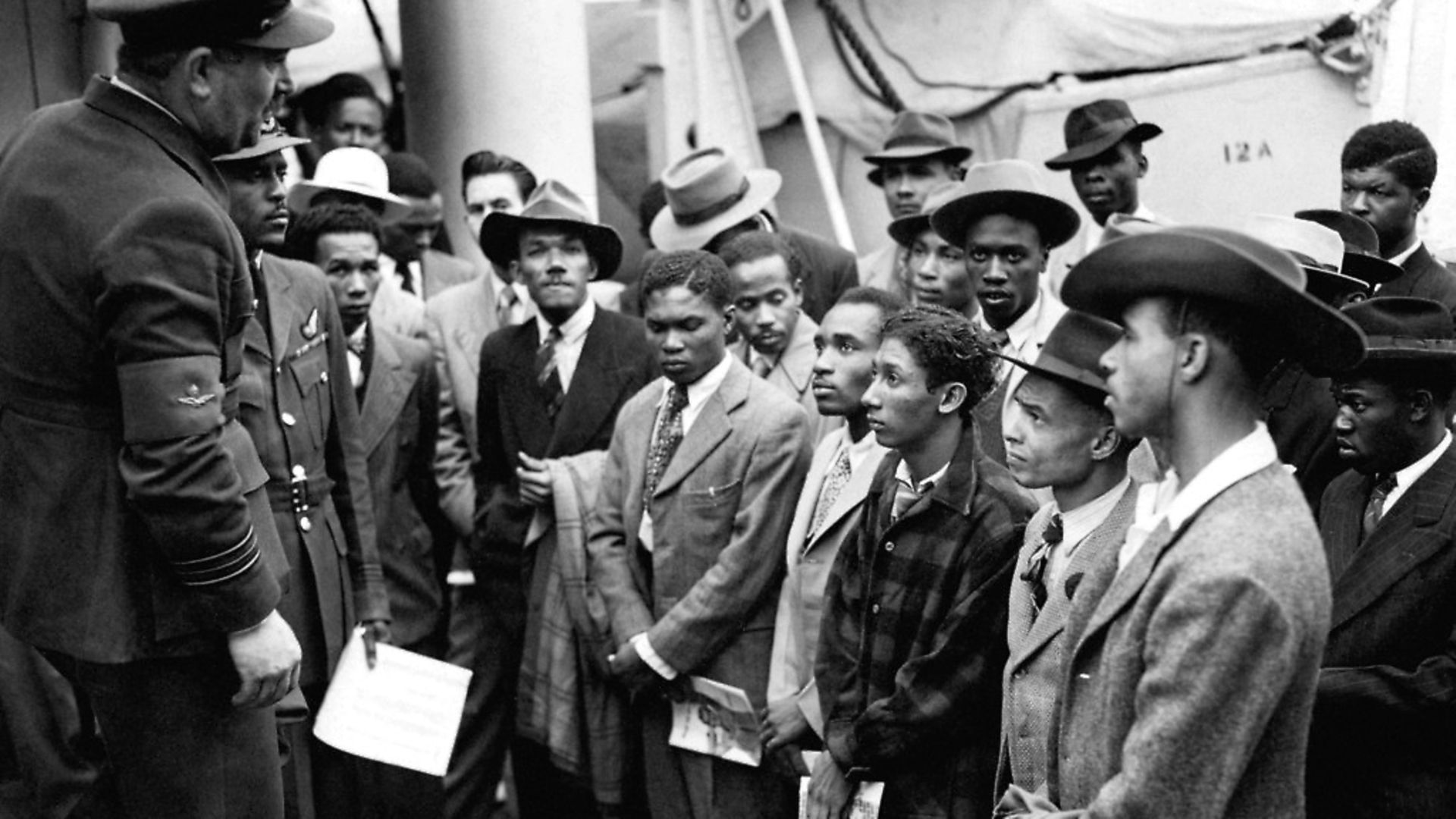Jamaican immigrants welcomed by RAF officials from the Colonial Office after the ex-troopship HMT 'Empire Windrush' landed them at Tilbury.
Photo: PA - Credit: PA Archive/PA Images