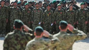 British and Afghan troops standing side by side at Camp Shorabak, Helmand Province in Afghanistan to mark Remembrance together for the first time during a special parade. - Credit: PA Archive/PA Images