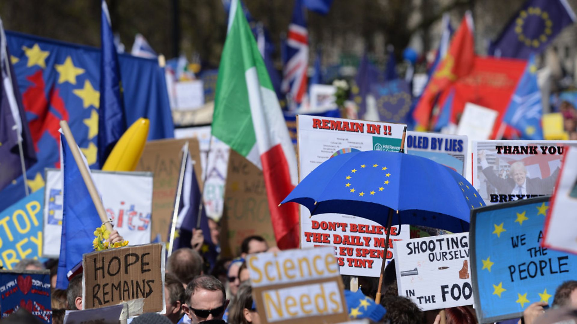 Placards and flags are held by pro-EU protesters taking part in a March for Europe rally against Brexit in central London. - Credit: PA Wire/PA Images