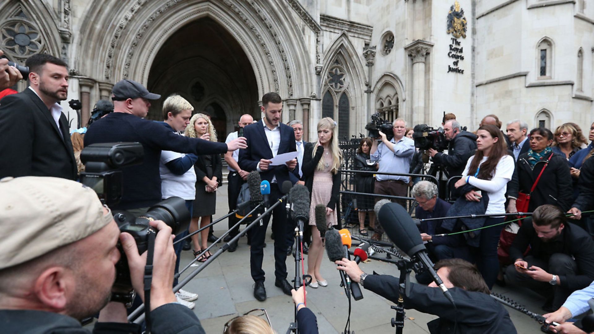 Charlie Gard's parents Chris Gard and Connie Yates speak to the media outside the High Court, London, after they ended their legal fight over treatment for the terminally-ill baby. - Credit: PA Wire/PA Images