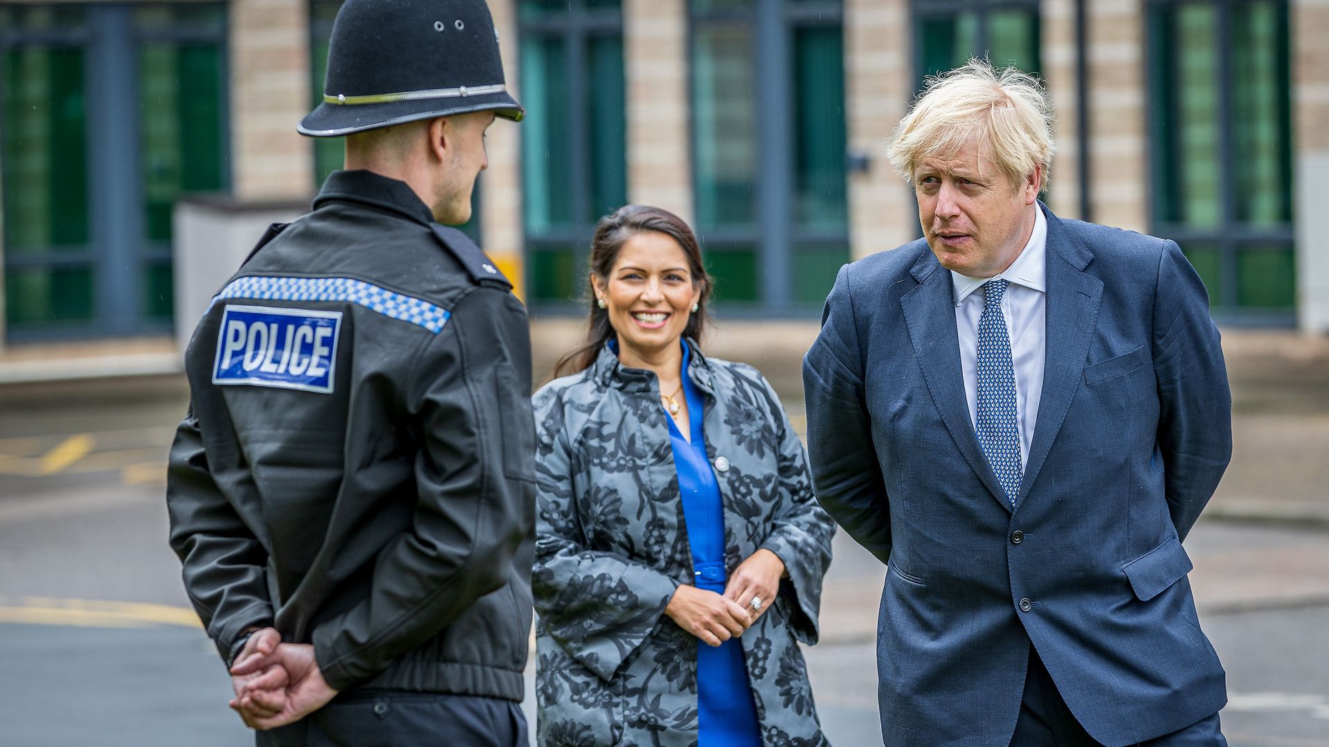 Prime Minister Boris Johnson and Home Secretary Priti Patel are introduced to recently graduated Police Officers - Credit: PA