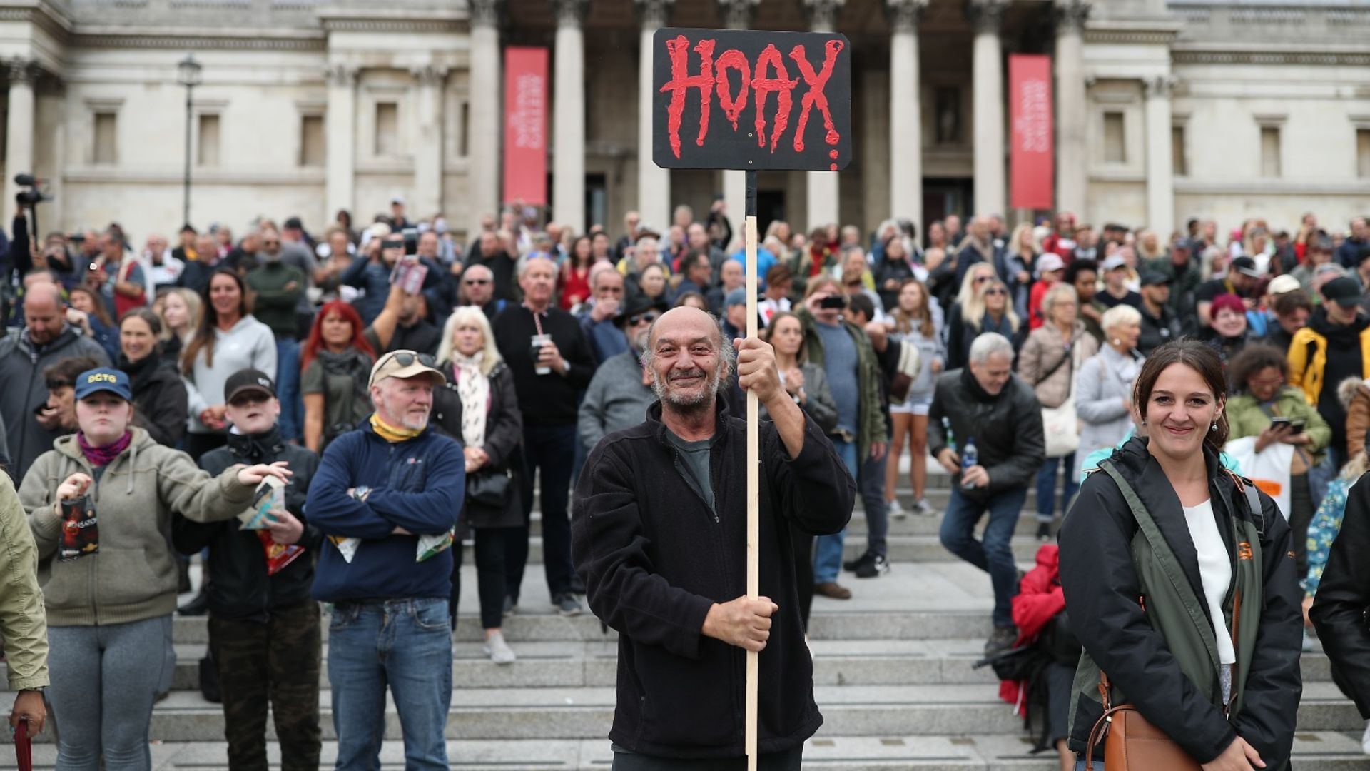 Anti-lockdown protesters, who believe that the coronavirus pandemic is a hoax, gather at the 'Unite For Freedom' rally in Trafalgar Square. - Credit: Yui Mok/PA.