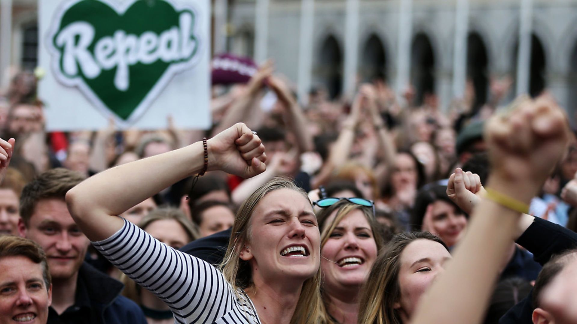 People celebrate at Dublin Castle as the official results of the referendum on the 8th Amendment of the Irish Constitution are announced in favour of the yes vote. Picture date: Saturday May 26, 2018. Photo: Brian Lawless/PA Wire - Credit: PA Wire/PA Images