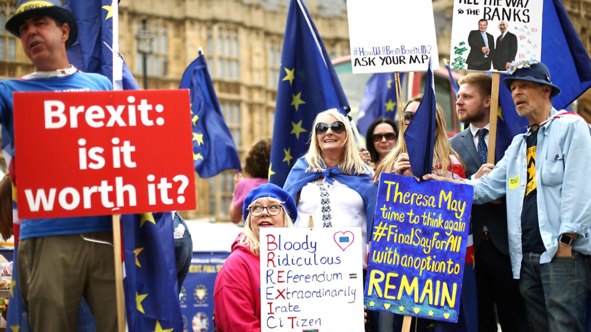 Anti-Brexit demonstrators campaign opposite the Houses of Parliament in London. Photograph: Yui Mok/PA Wire. - Credit: PA