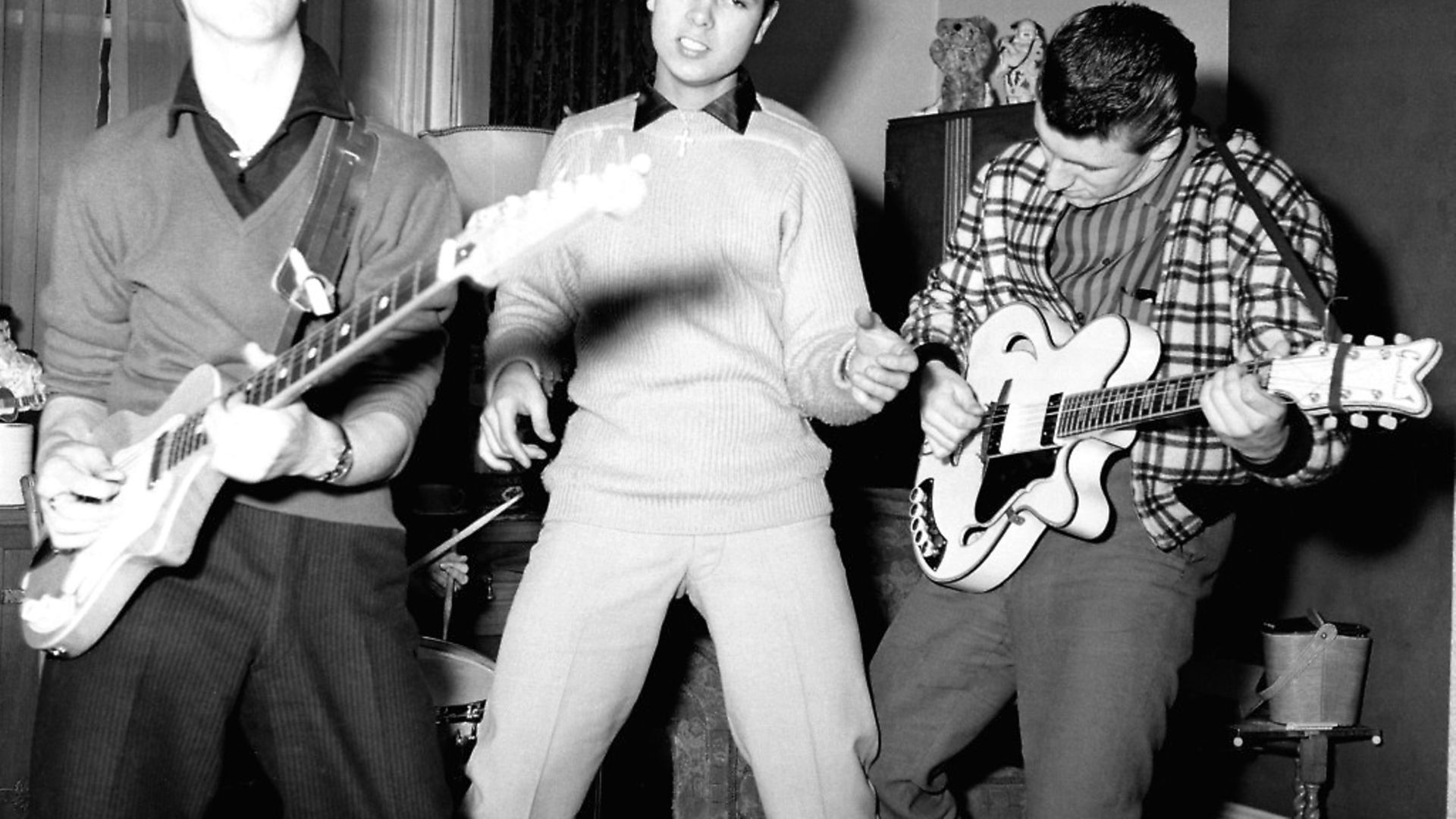 UNITED KINGDOM - JANUARY 01:  Photo of Cliff RICHARD and SHADOWS; posed with The Shadows (when they were called The Drifters) - L-R: Hank Marvin, Cliff Richard, Bruce Welch - c.1959  (Photo by Beverly Lebarrow/Redferns) - Credit: Redferns