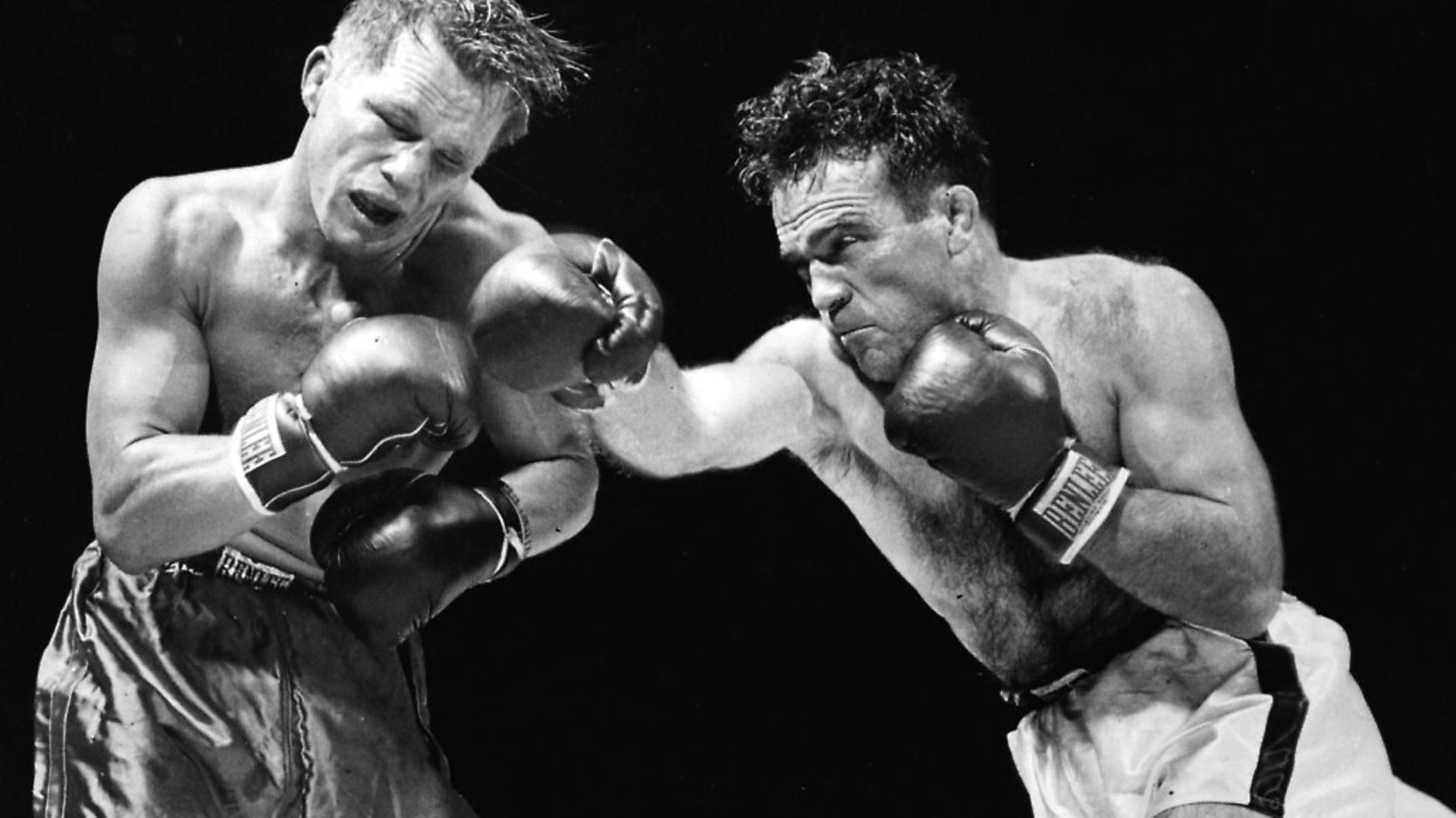 Marcel Cerdan of France delivers a hard right to American boxer Tony Zale's face during their World Middleweight Championship bout at the Roosevelt Stadium, Jersey City. Cerdan won the title in 11 rounds. (Photo by Keystone/Getty Images) - Credit: Getty Images