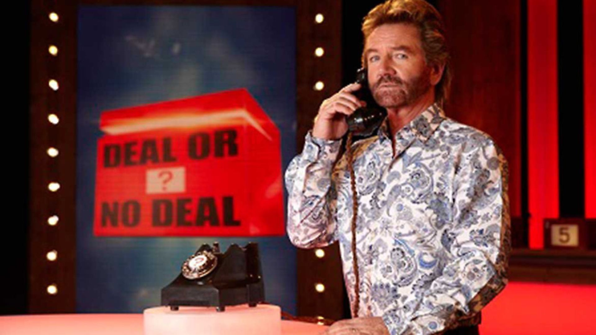 Noel Edmonds on Deal or No Deal. Photograph: Channel 4. - Credit: Archant