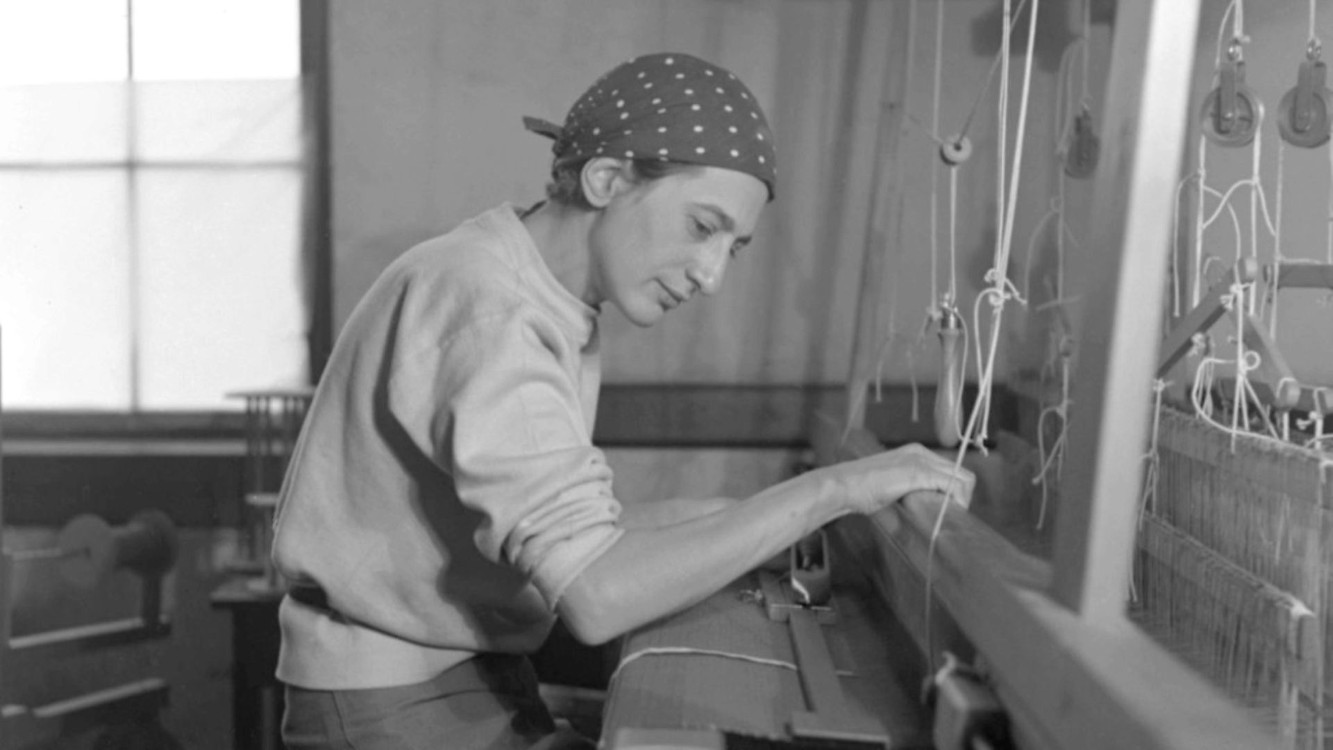 anni albers in her weaving studio at black mountain college, 1937. Photo: The Josef and Anni Albers Foundation - Credit: Archant