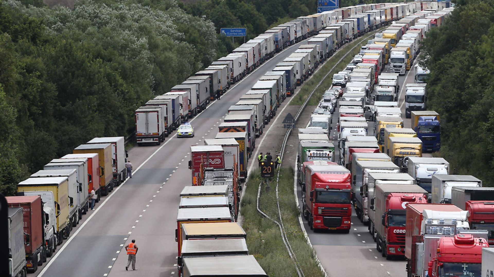 Trucks line up on the M20.  (Photo by Peter Macdiarmid/Getty Images) - Credit: Getty Images
