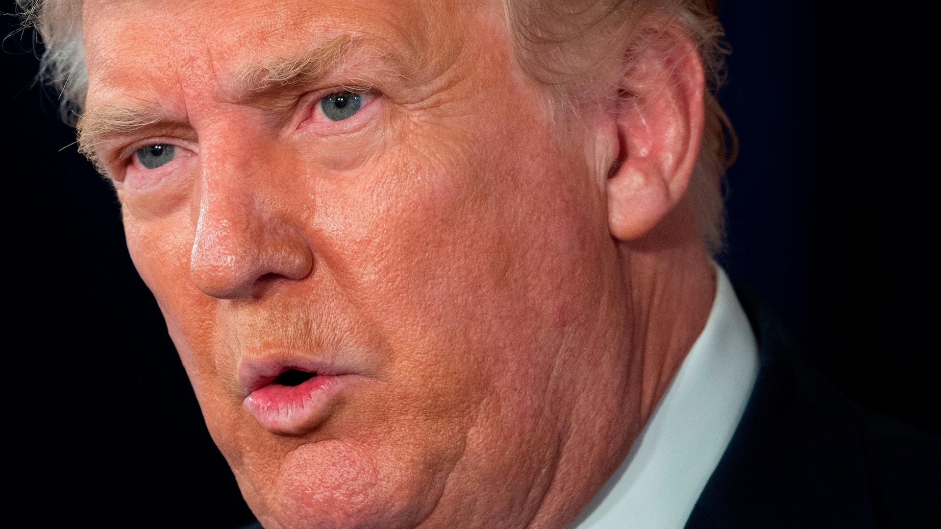 US President Donald Trump speaks during a press conference - Credit: AFP via Getty Images