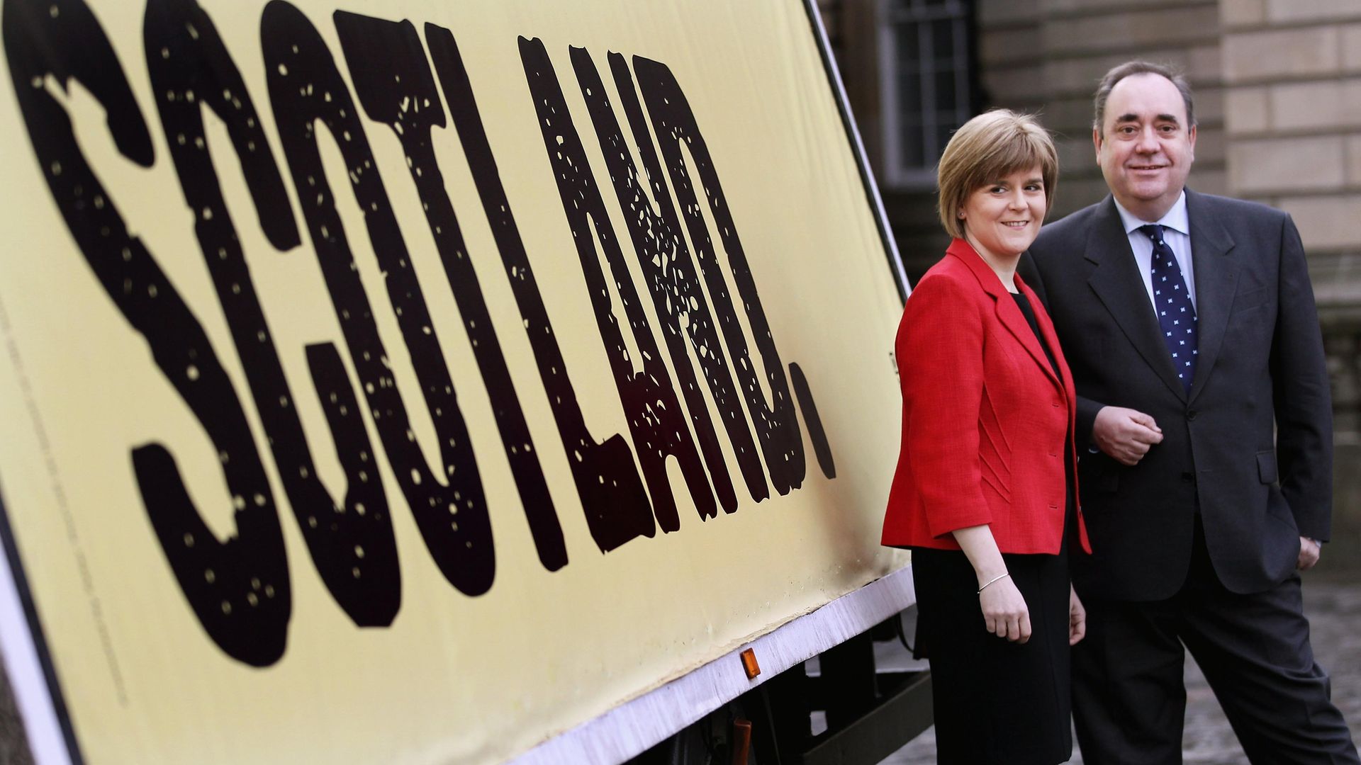 SPLIT: Former Scotland first minister Alex Salmond and then-deputy and successor as first minister Nicola Sturgeon pose together during a SNP campaign poster launch in 2011 (Photo: Getty Images) - Credit: Getty Images