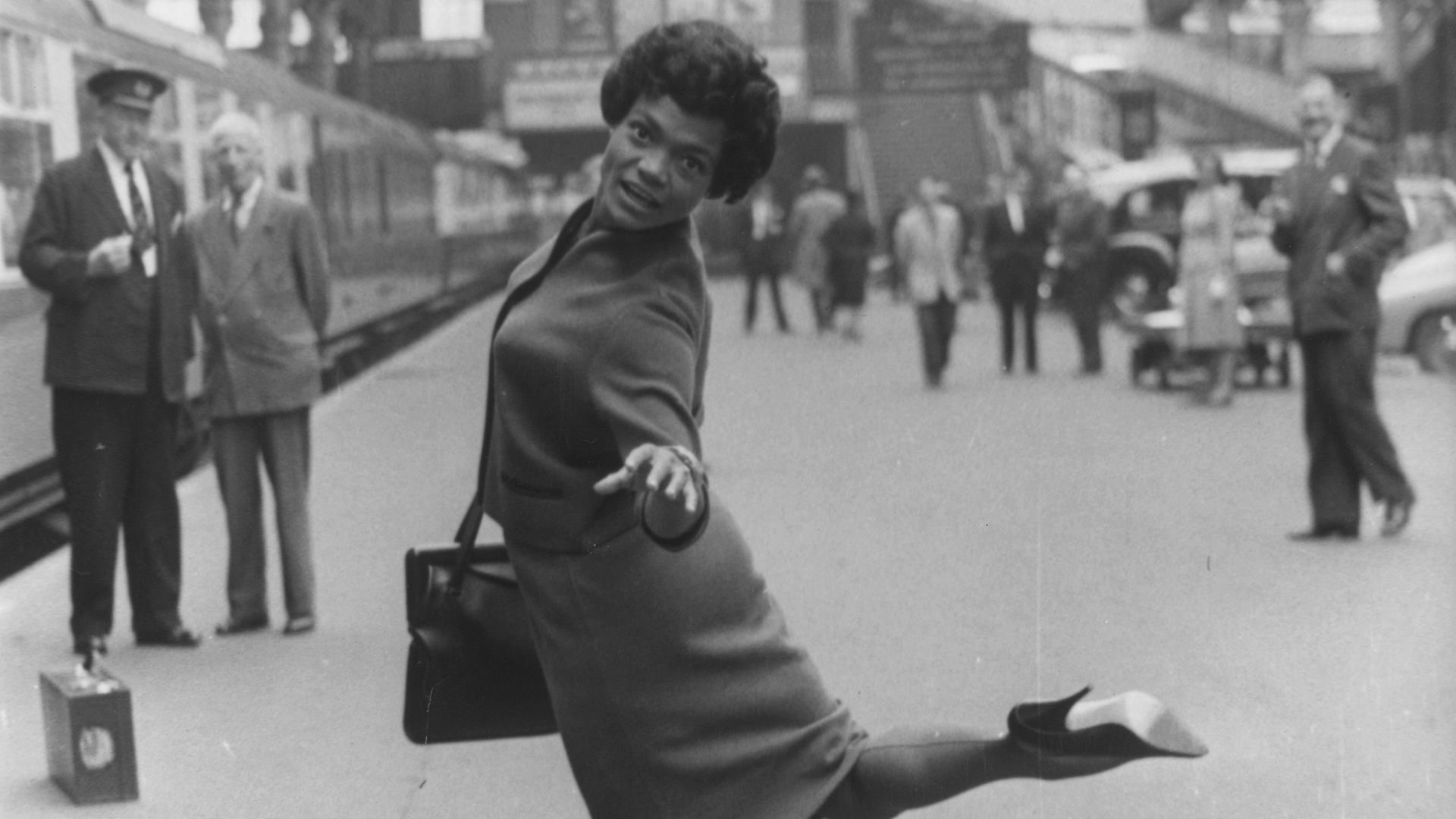 American jazz singer Eartha Kitt at Paddington Railway station before the start of a two month cabaret tour - Credit: Getty Images