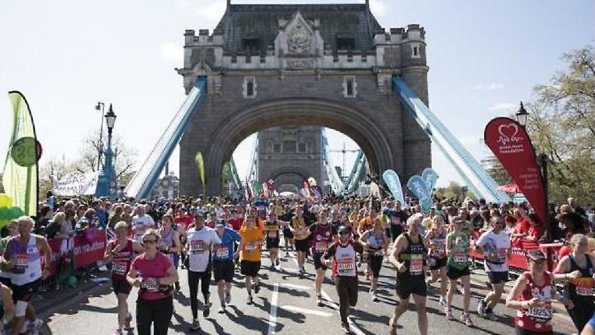 London Marathon runners set to cross Tower Bridge like those last year. Picture source: LBTH - Credit: LBTH