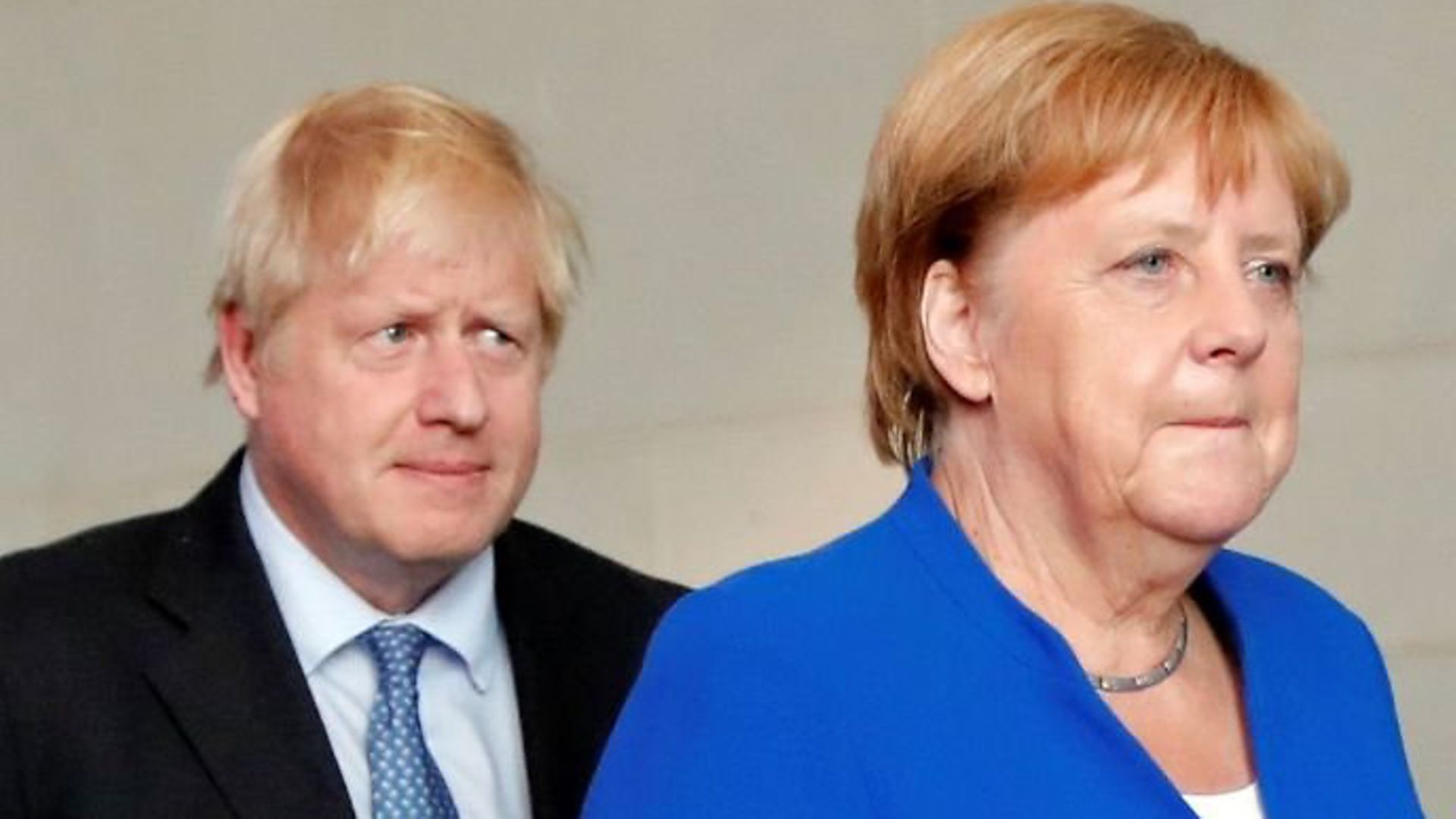 Boris Johnson and Angela Merkel have had different approaches to the coronavirus - Credit: PA