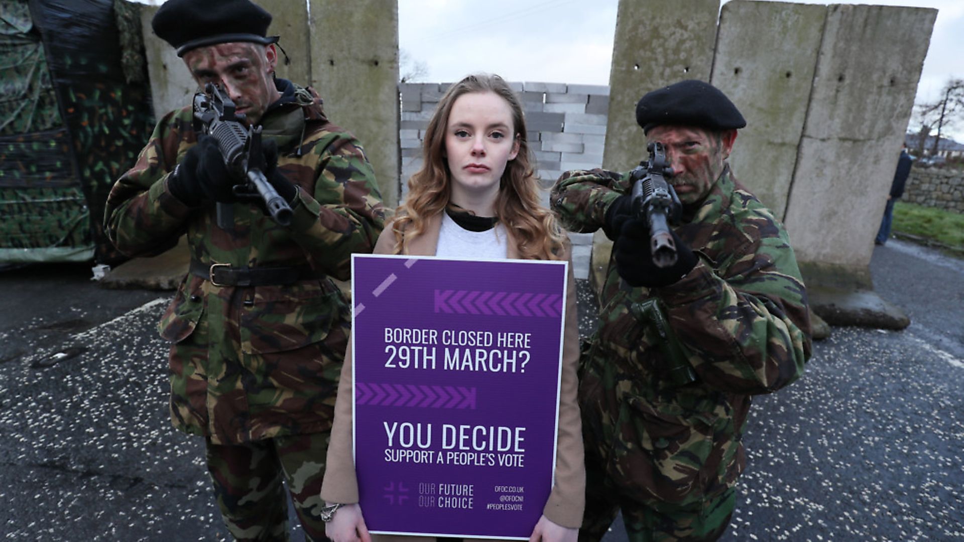 People take part in an anti-Brexit rally at the Irish border near Carrickcarnan, Co Louth, expressing their opposition to the imposition of a hard border between the Republic of Ireland and Northern Ireland. Photograph: Brian Lawless/PA Wire - Credit: PA