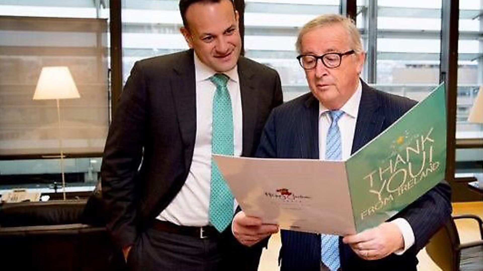 Leo Varadkar and Jean-Claude Junker with a 'Thank You' card from an Irish citizen. Photograph: Margaritis Schinas/Twitter - Credit: Archant