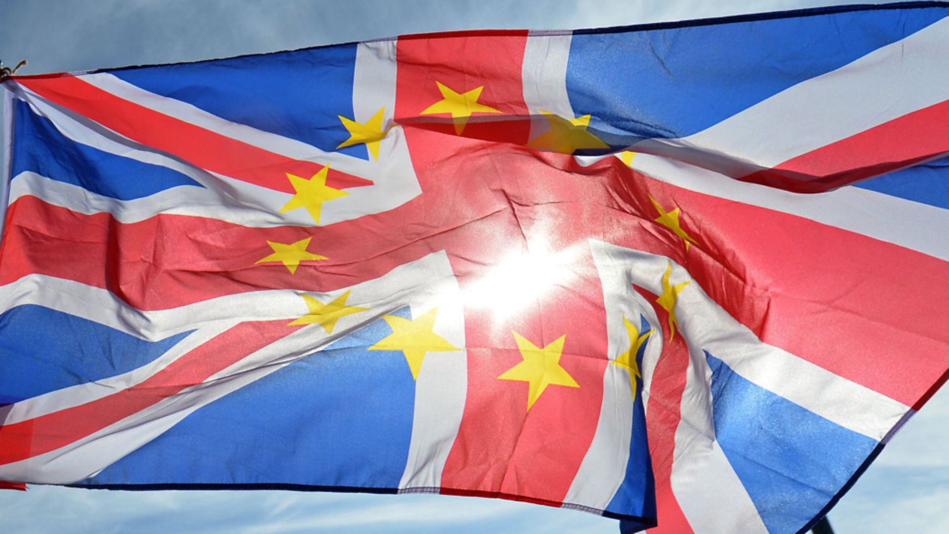 A pro-EU supporter holds a flag at a rally against Brexit - Credit: PA Archive/PA Images