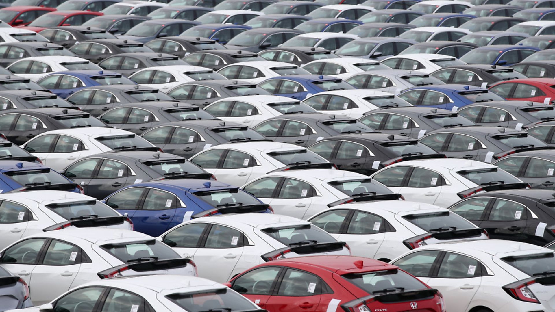 Honda cars lined up at Southampton Docks prior to being loaded onto a car container ship for export. Photograph: Andrew Matthews/PA. - Credit: PA Wire/PA Images
