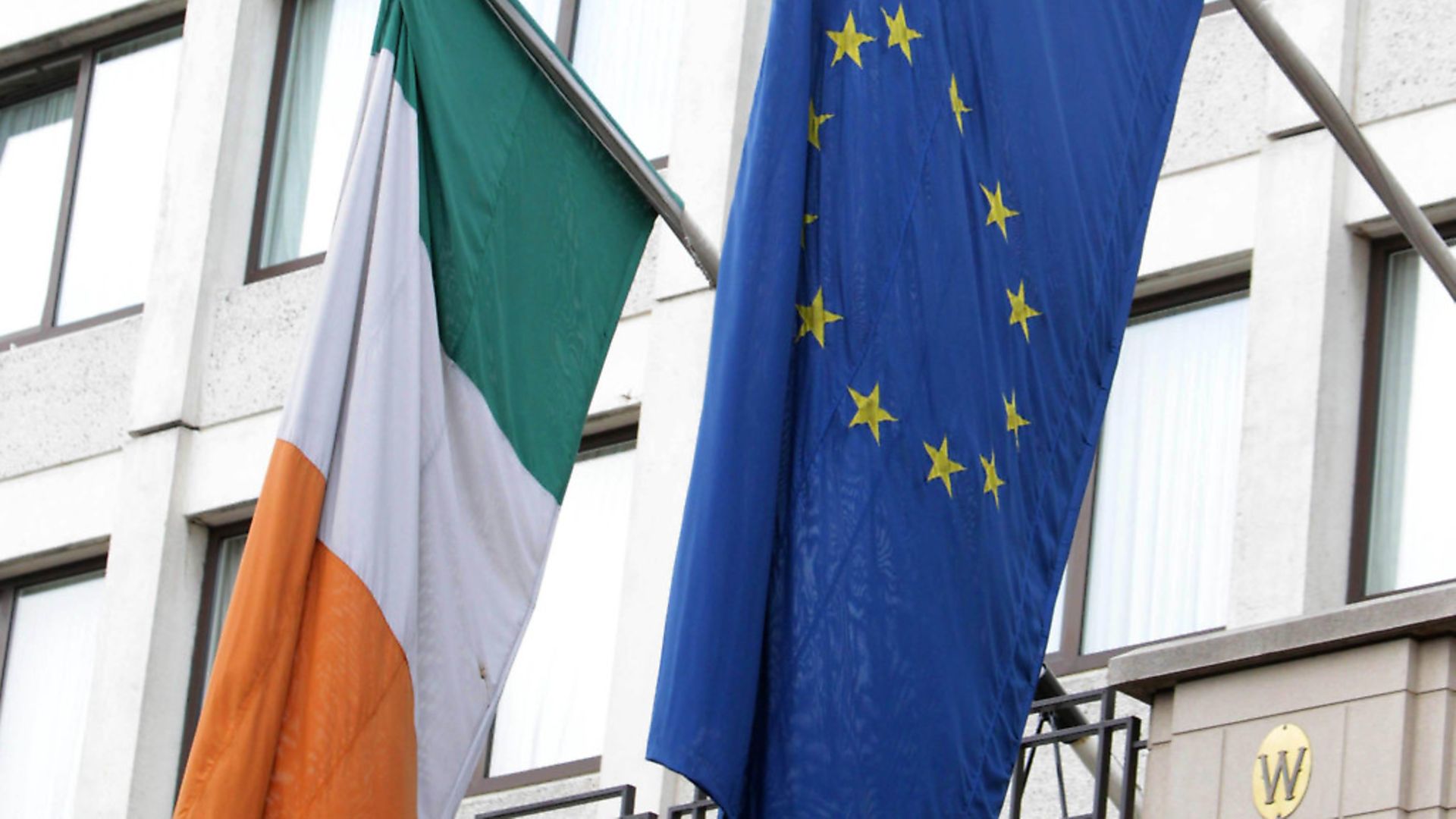 Irish and European flags hang from the Westbury Hotel in Dublin. Photograph: Niall Carson/PA. - Credit: PA Archive/PA Images