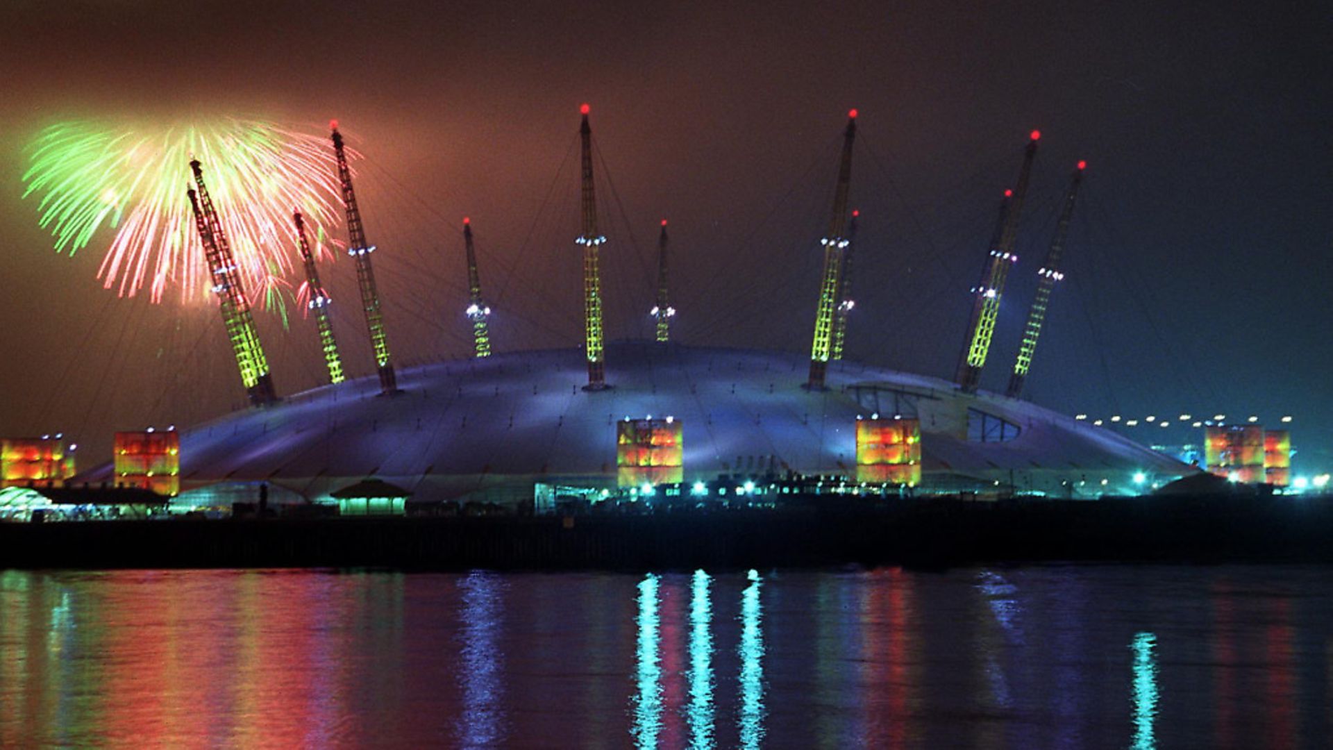 Fireworks light up the sky 01January 2000 on the strike of midnight as low cloud threatens to engulf Britain's flagship millennium dome, now called The O2. Picture: HUGO PHILPOTT/AFP/Getty Images - Credit: AFP/Getty Images