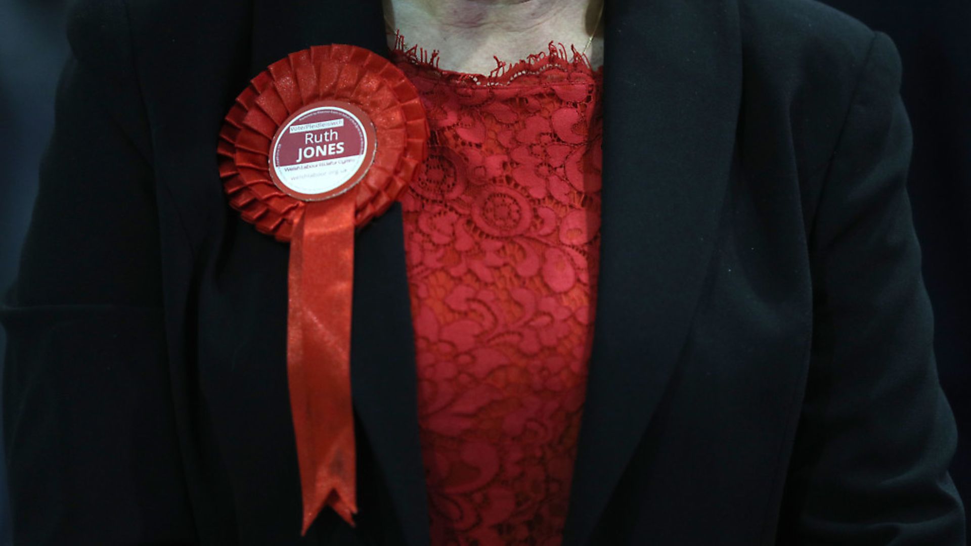 A rosette on the jacket of Welsh Labour candidate Ruth Jones as she awaits the results of the Newport West by-election. Photograph: Andrew Matthews/PA Wire - Credit: PA