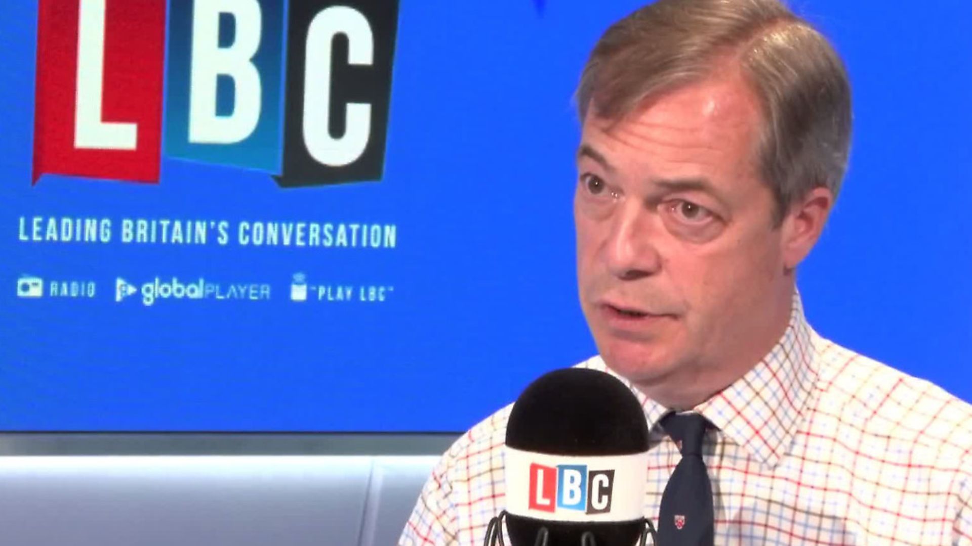Nigel Farage answers questions about the Brexit Party funding on LBC Radio. Photograph: LBC/Global. - Credit: Archant