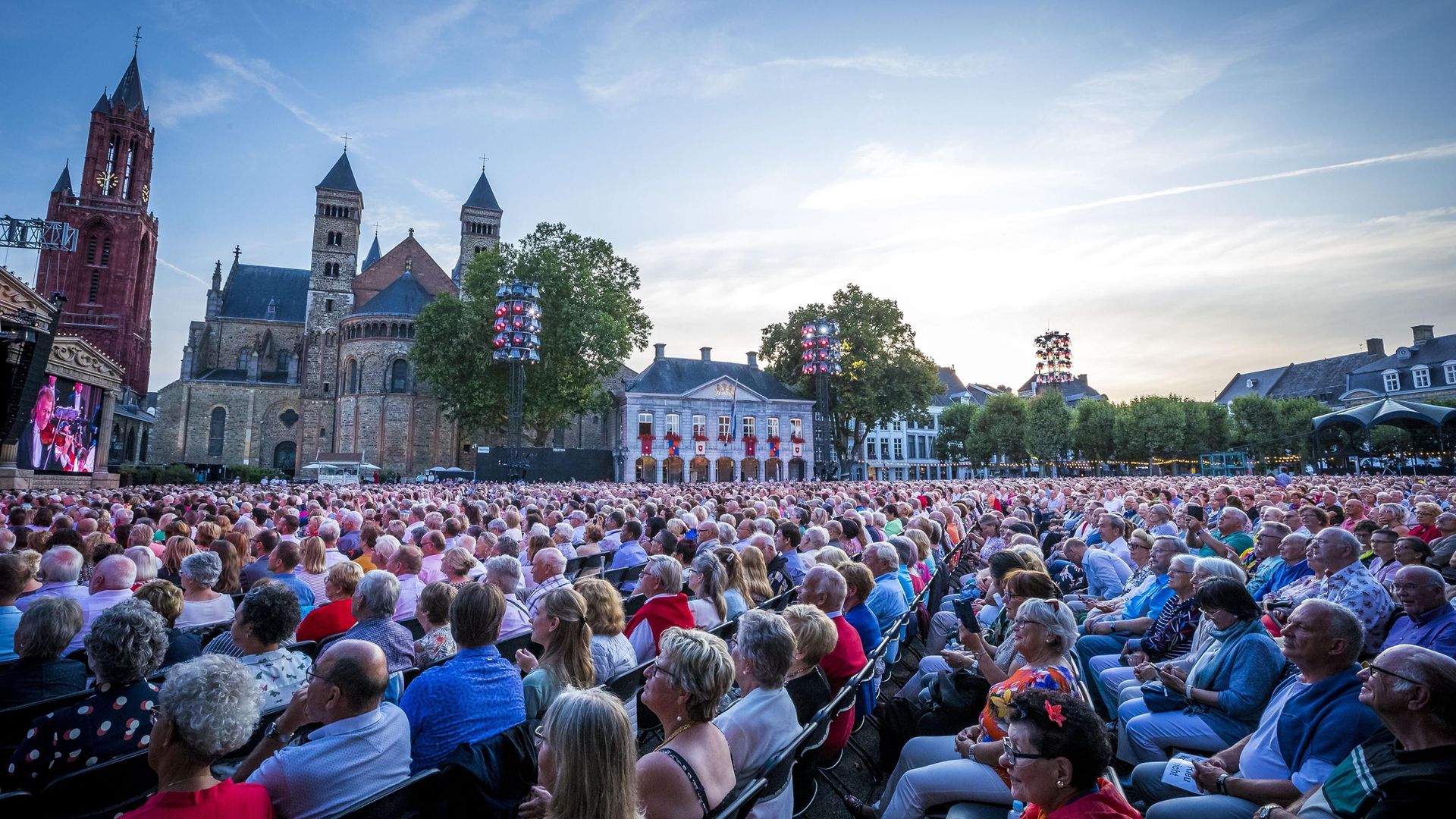 People attend a concert of Dutch violinist and concert director Andre Rieu as he performs for the 100th time on the Vrijthof square in Maastricht, on July 21, 2019. - Credit: AFP via Getty Images