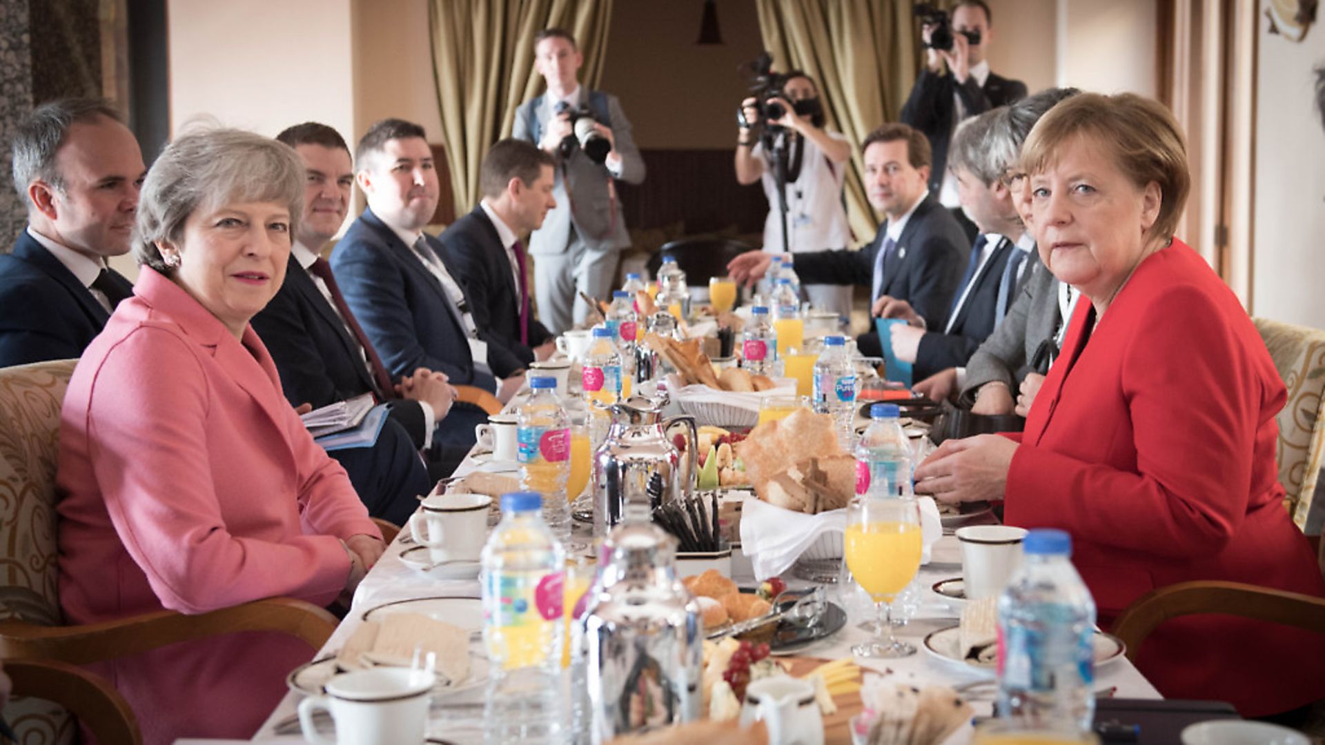 Theresa May (left) has a breakfast meeting with German Chancellor Angela Merkel (right) at the EU-League of Arab States Summit. Photograph: Stefan Rousseau/PA. - Credit: PA Wire/PA Images