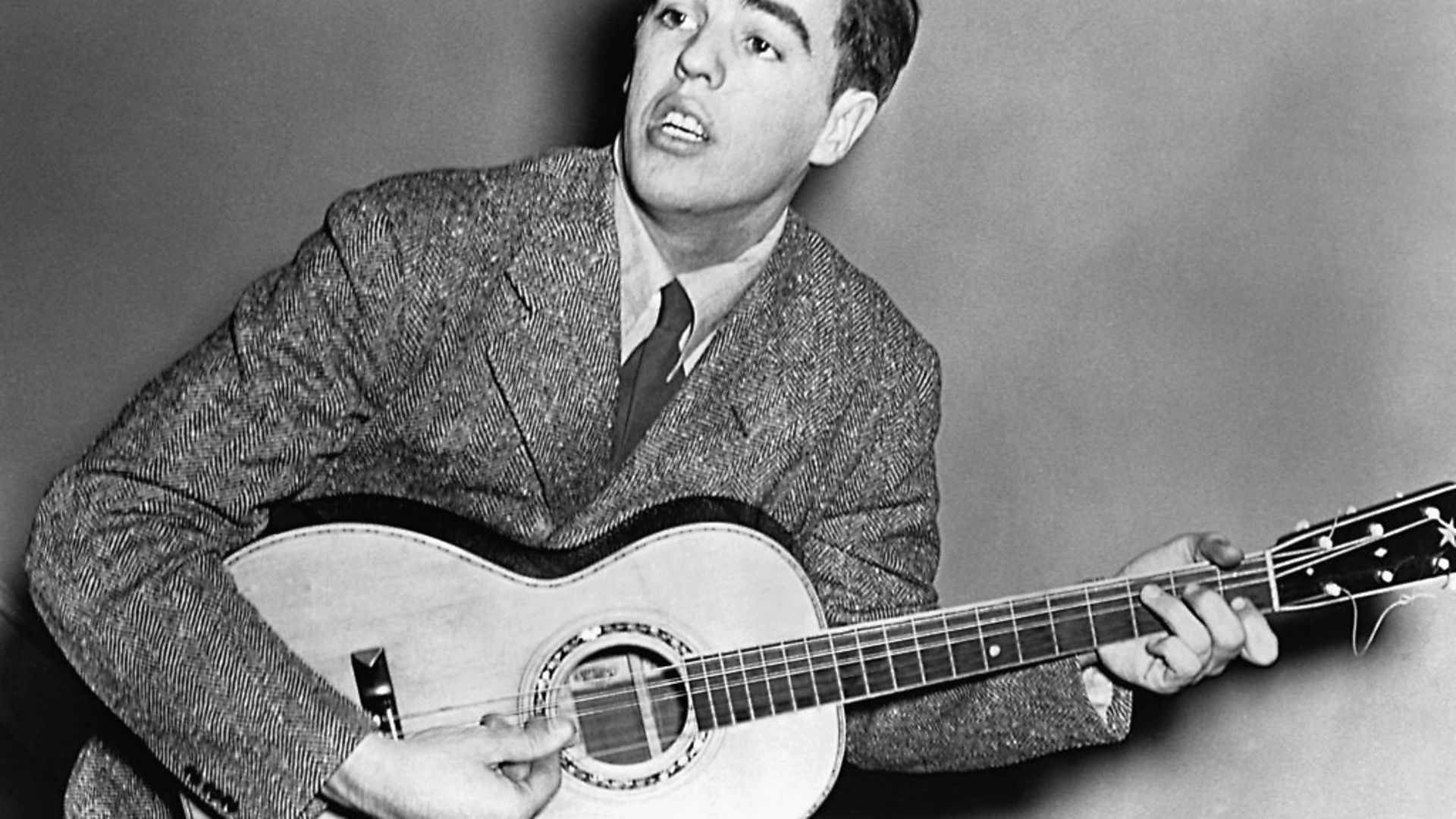 Singer/songwriter, Alan Lomax joined his father, John Lomax in 1933 and they colloborated in compiling "American Ballads and Folk Songs" and "Our Singing Country." (Photo by © CORBIS/Corbis via Getty Images) - Credit: Corbis via Getty Images