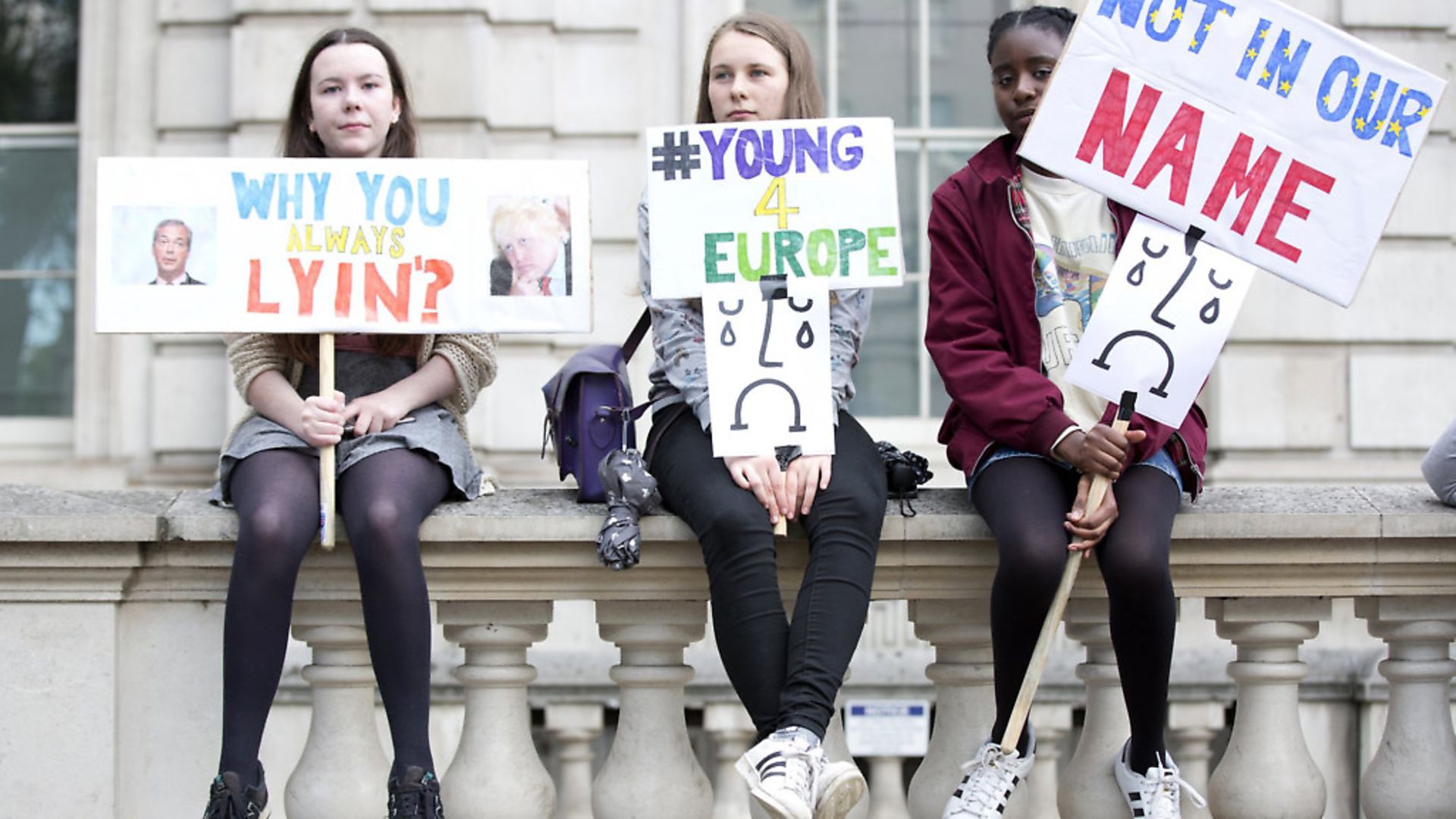 Young anti-Brexit protesters demonstrate at the gates of Downing Street. Isabel Infantes/PA. - Credit: PA Archive/PA Images