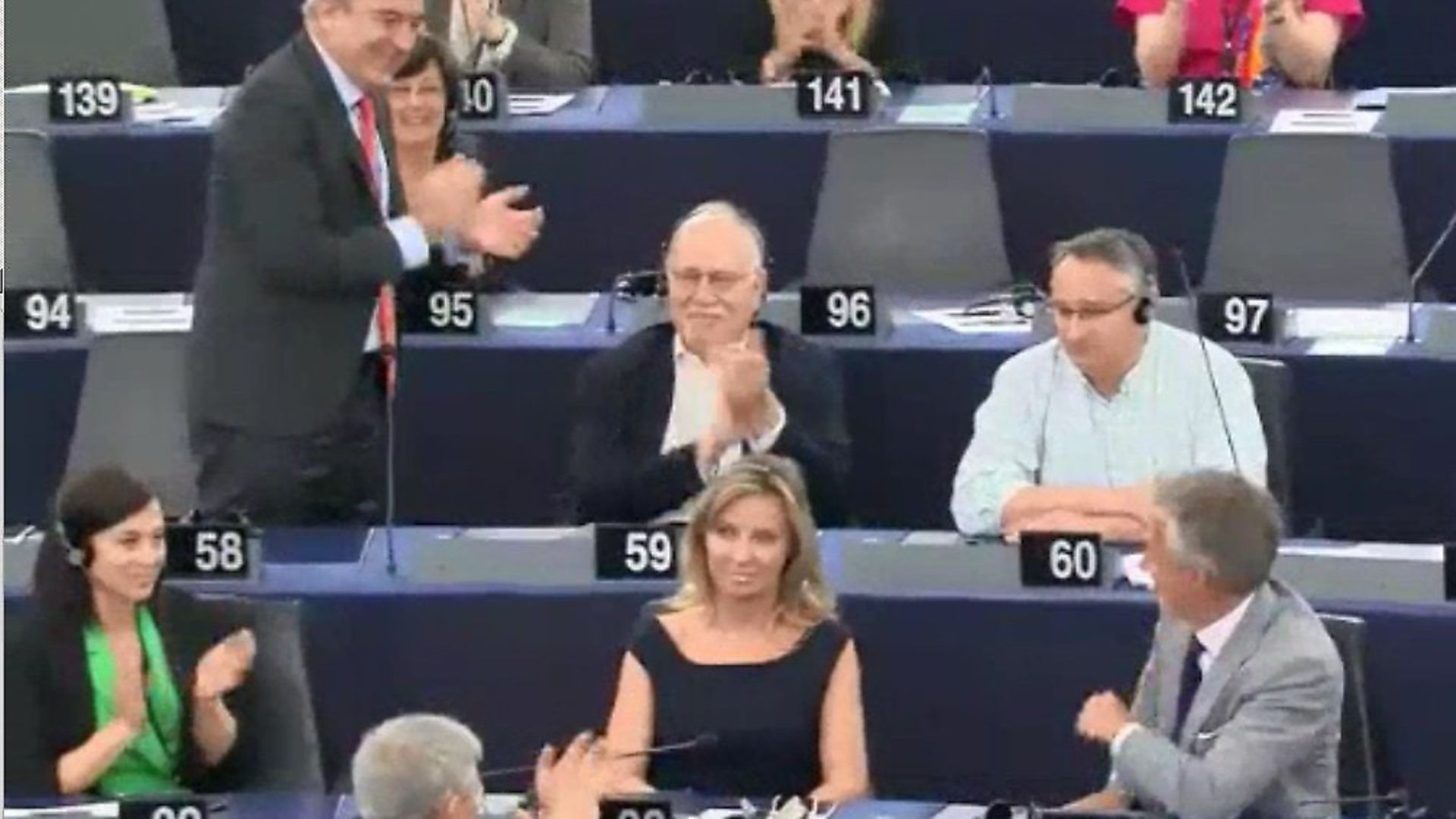 Martin Horwood is applauded in the European parliament. Photograph: European Parliament. - Credit: Archant