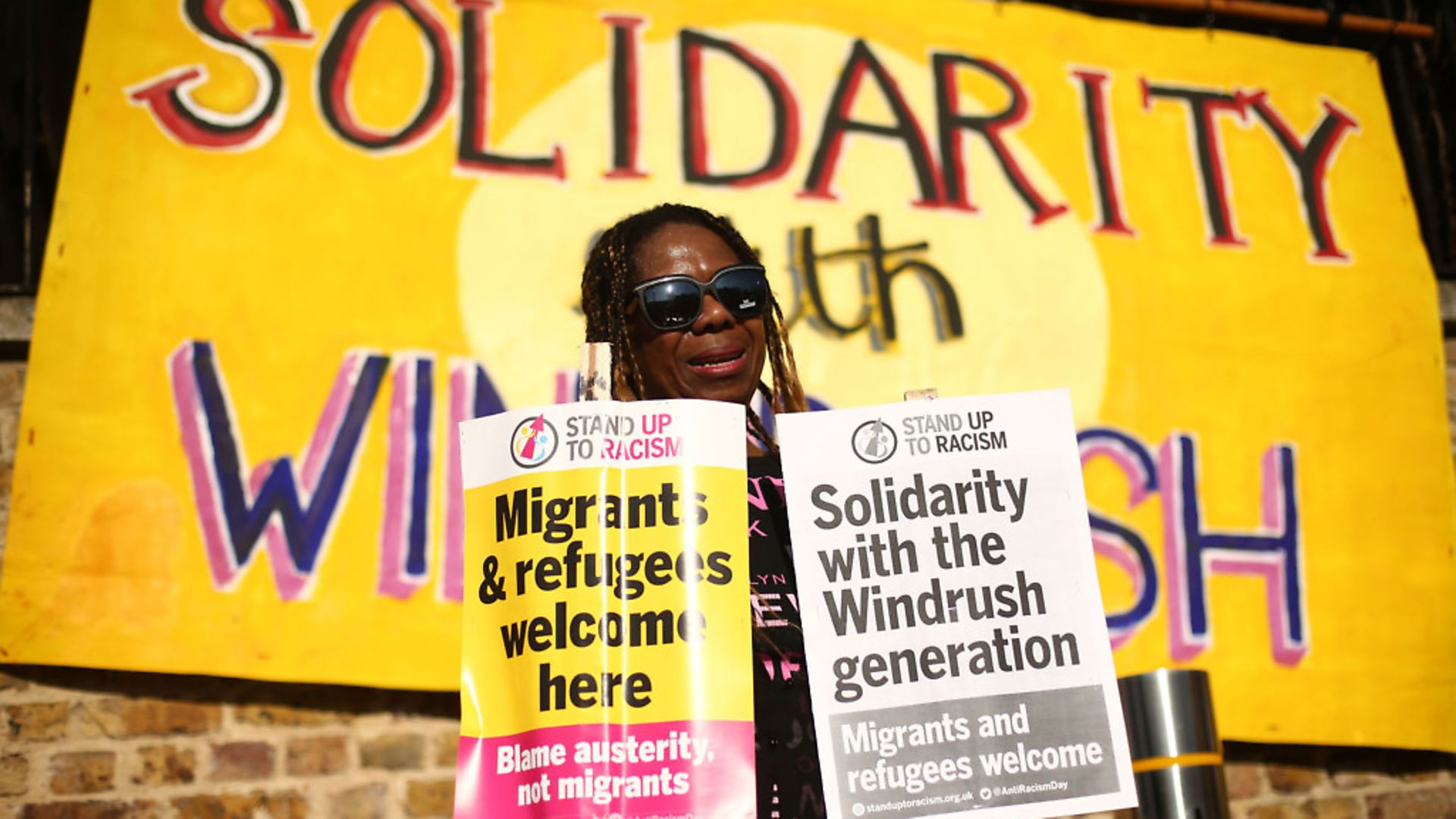 A campaigner at an event organised by Stand up to Racism in solidarity with the Windrush generation and their families. Photograph: Yui Mok/PA. - Credit: PA Archive/PA Images