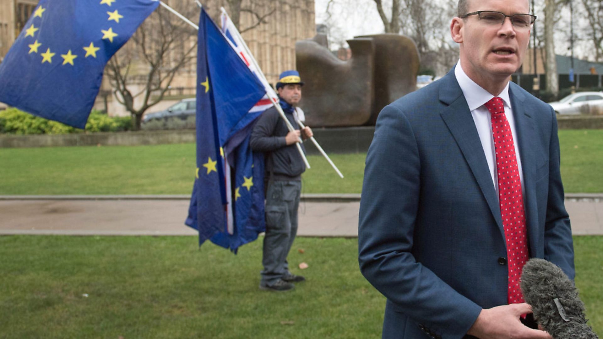 Irish Foreign Affairs Minister Simon Coveney speaks to the media on College Green in Westminster, London - Credit: PA Wire/PA Images