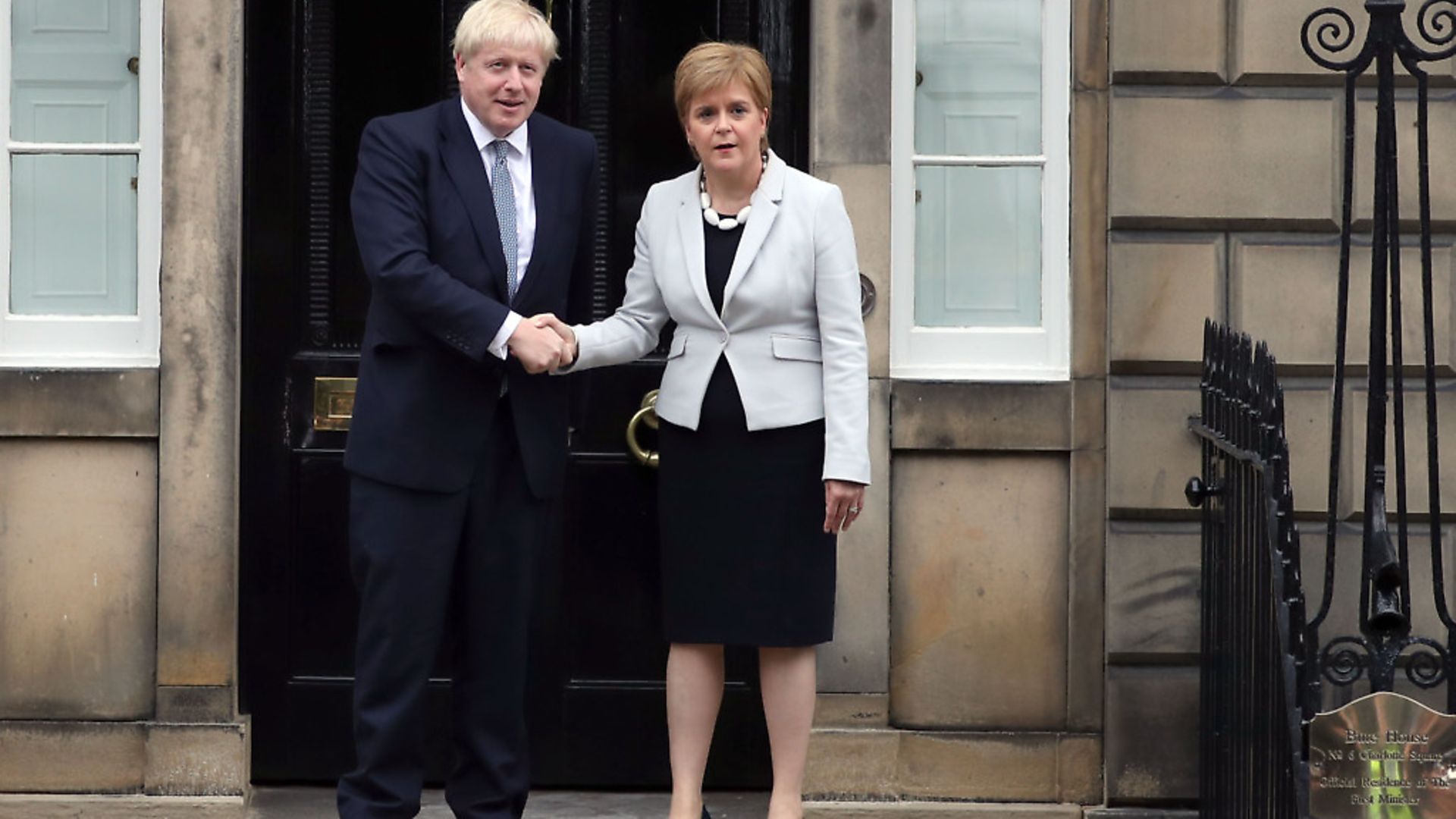 Scotland's First Minister Nicola Sturgeon welcomes Boris Johnson outside Bute House in Edinburgh ahead of their meeting. Photograph: Jane Barlow/PA Wire. - Credit: PA
