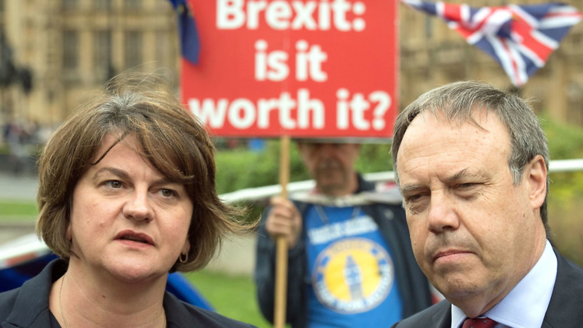 DUP leader Arlene Foster and deputy leader Nigel Dodds in Westminster pictured with anti-Brexit campaigner Steve Bray. Photograph: Stefan Rousseau/PA. - Credit: PA Wire/PA Images