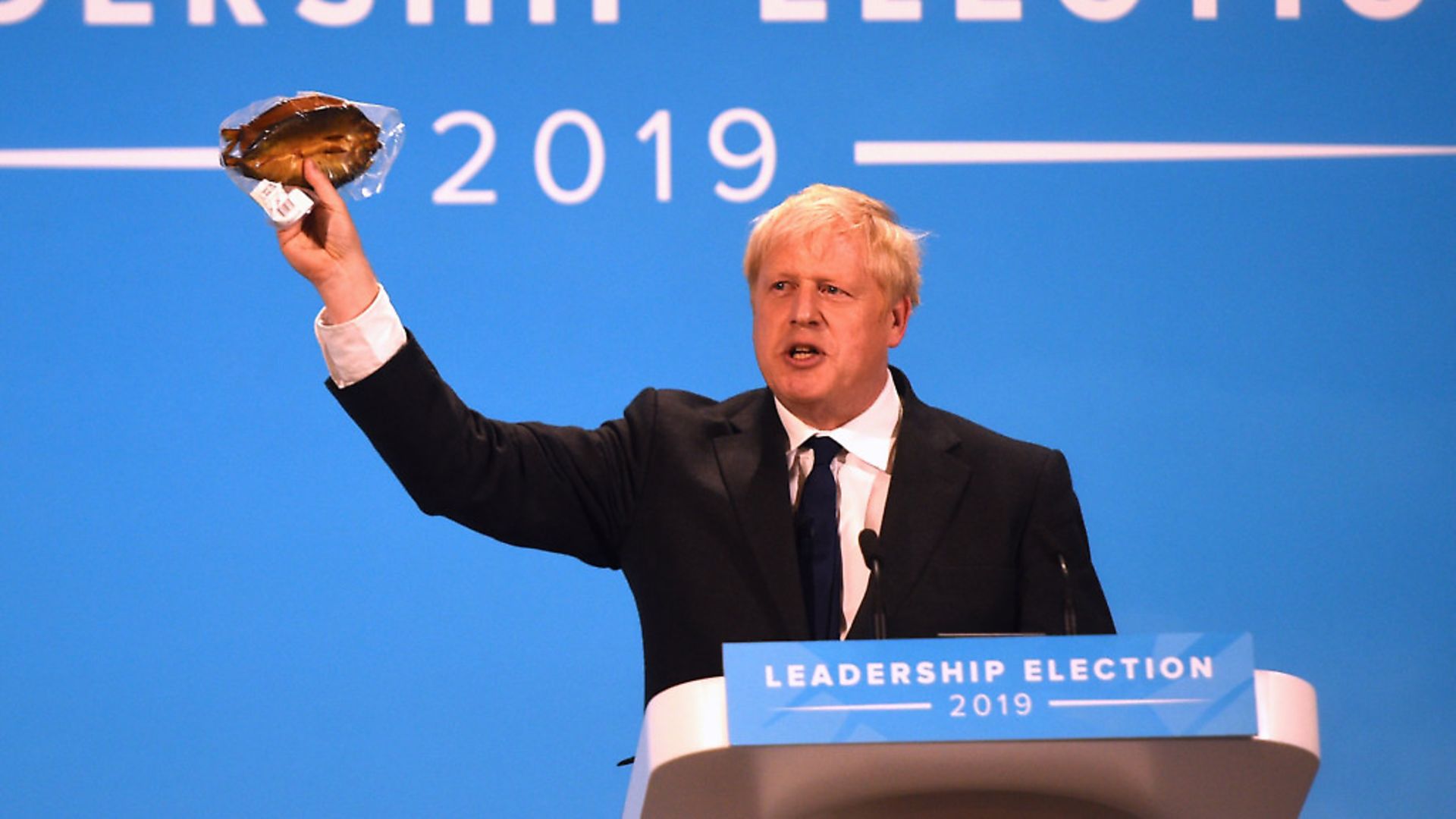 Conservative Party leadership candidate Boris Johnson brandishes a kipper during the final Tory leadership hustings. Picture: Kirsty O'Connor/PA Wire/PA Images - Credit: PA Wire/PA Images