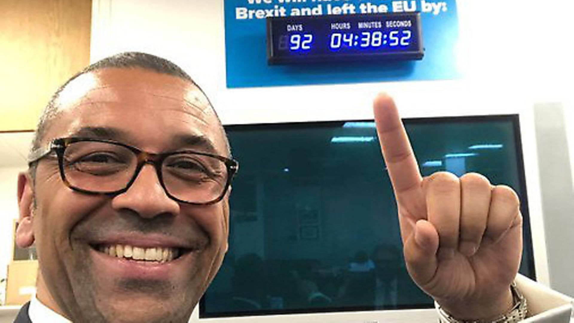 James Cleverly poses with CCHQ's own countdown clock. Photograph: Twitter. - Credit: Archant