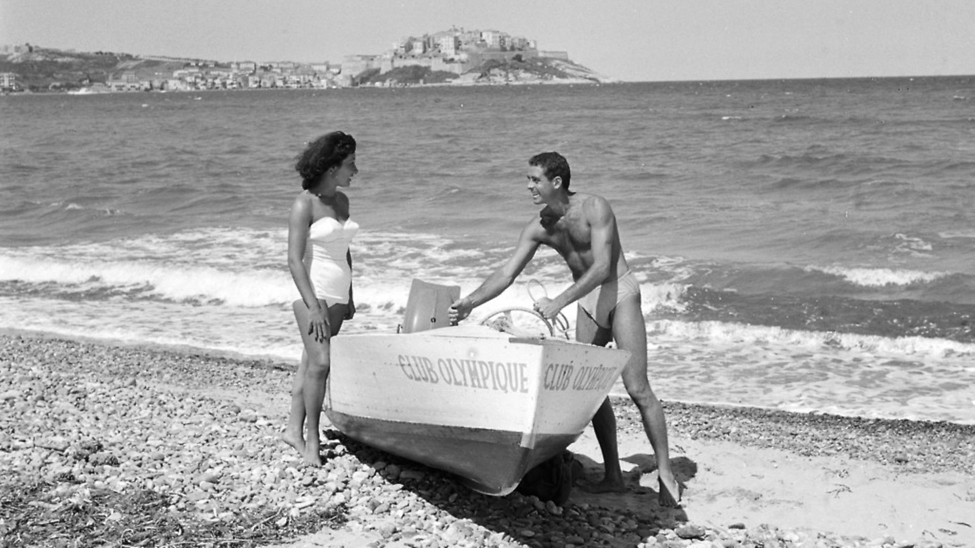 Holidaymakers in Calvi, Sardinia, home of the first package holiday in 1953. Picture: Getty Images - Credit: Paris Match via Getty Images