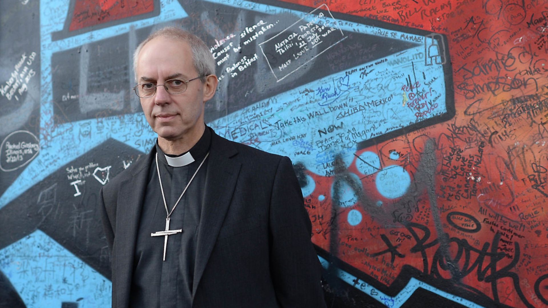 The Archbishop of Canterbury, Justin Welby during his visit to Belfast, stops at the Peace Wall. (Photo by NurPhoto/NurPhoto via Getty Images) - Credit: NurPhoto via Getty Images