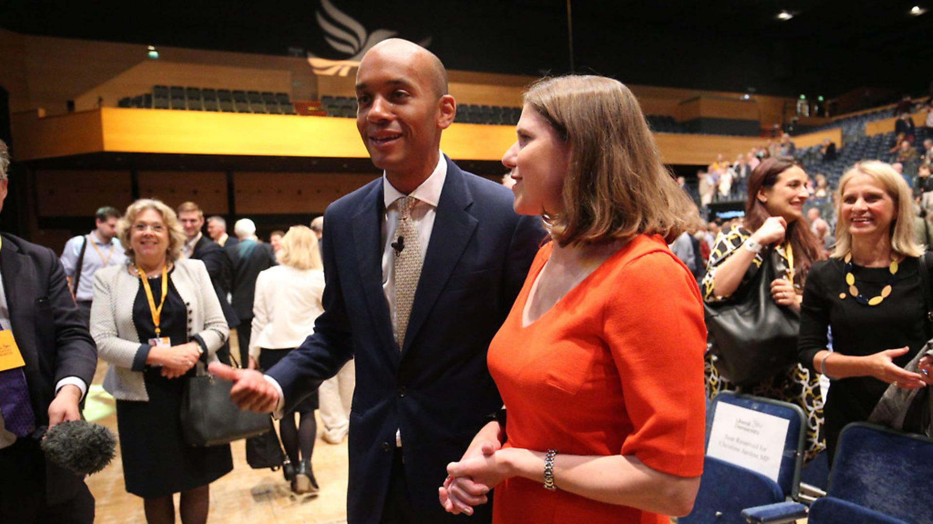 Chuka Umunna (left) is joined by Jo Swinson (right) following his speech during the Liberal Democrats autumn conference at the Bournemouth International Centre in Bournemouth. Photograph: Jonathan Brady/PA. - Credit: PA Wire/PA Images