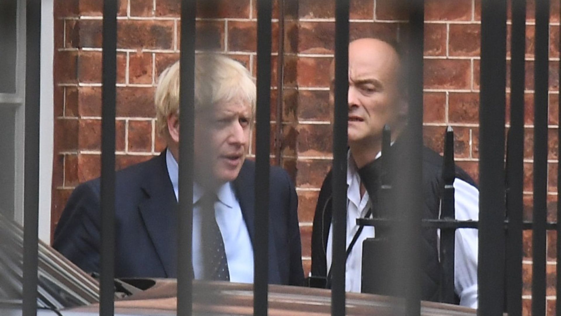 Prime Minister Boris Johnson with his senior aide Dominic Cummings in Downing Street - Credit: PA