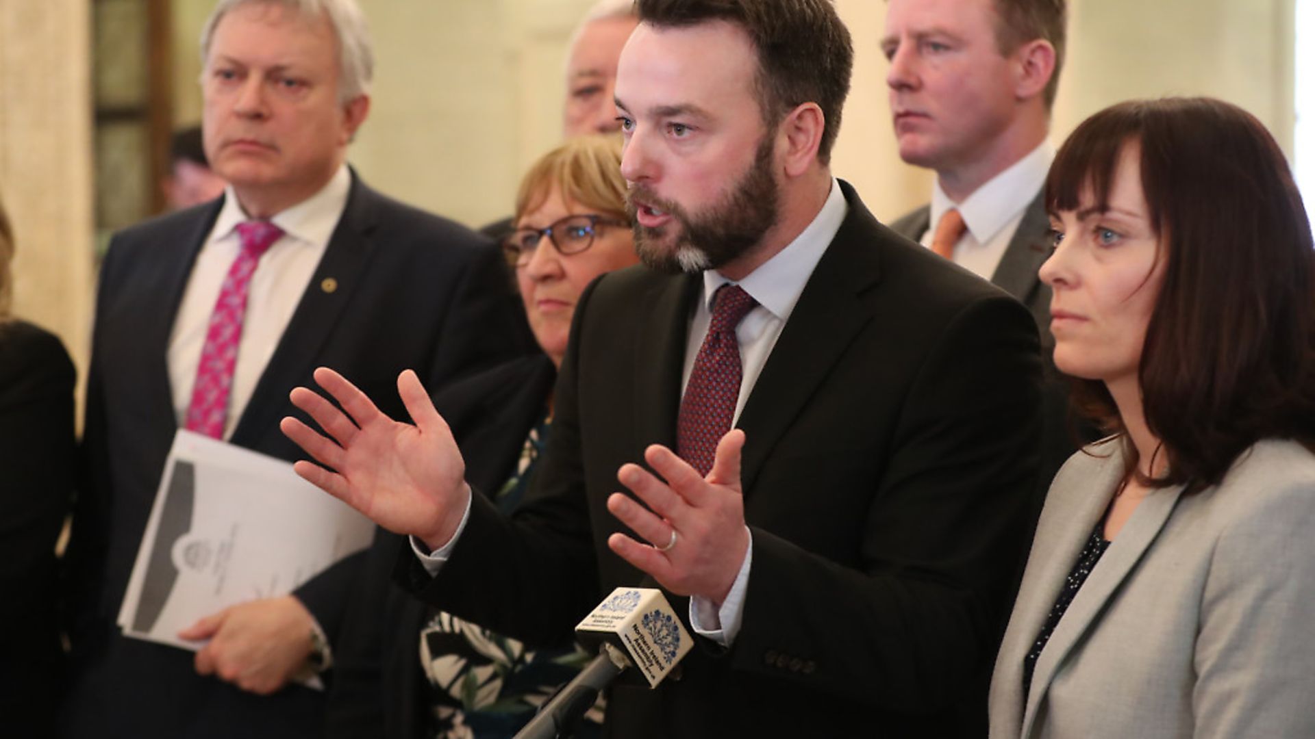 SDLP leader Colum Eastwood, with his MLAs, speaking to the media in Stormont parliament buildings in Belfast. Photograph: Niall Carson/PA. - Credit: PA Wire/PA Images