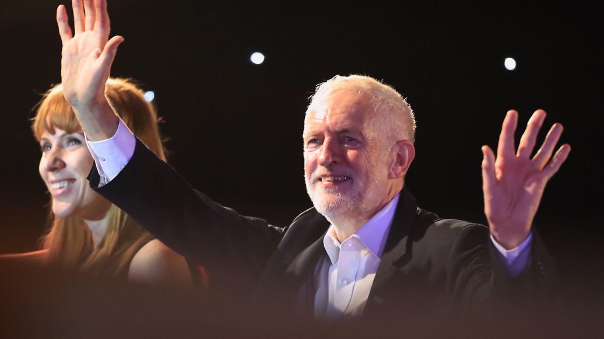 Labour Party leader Jeremy Corbyn and shadow education secretary Angela Rayner acknowledge supporter after he delivered a speech at the Grand Central Hall in Liverpool. Photograph: Danny Lawson/PA Wire. - Credit: PA