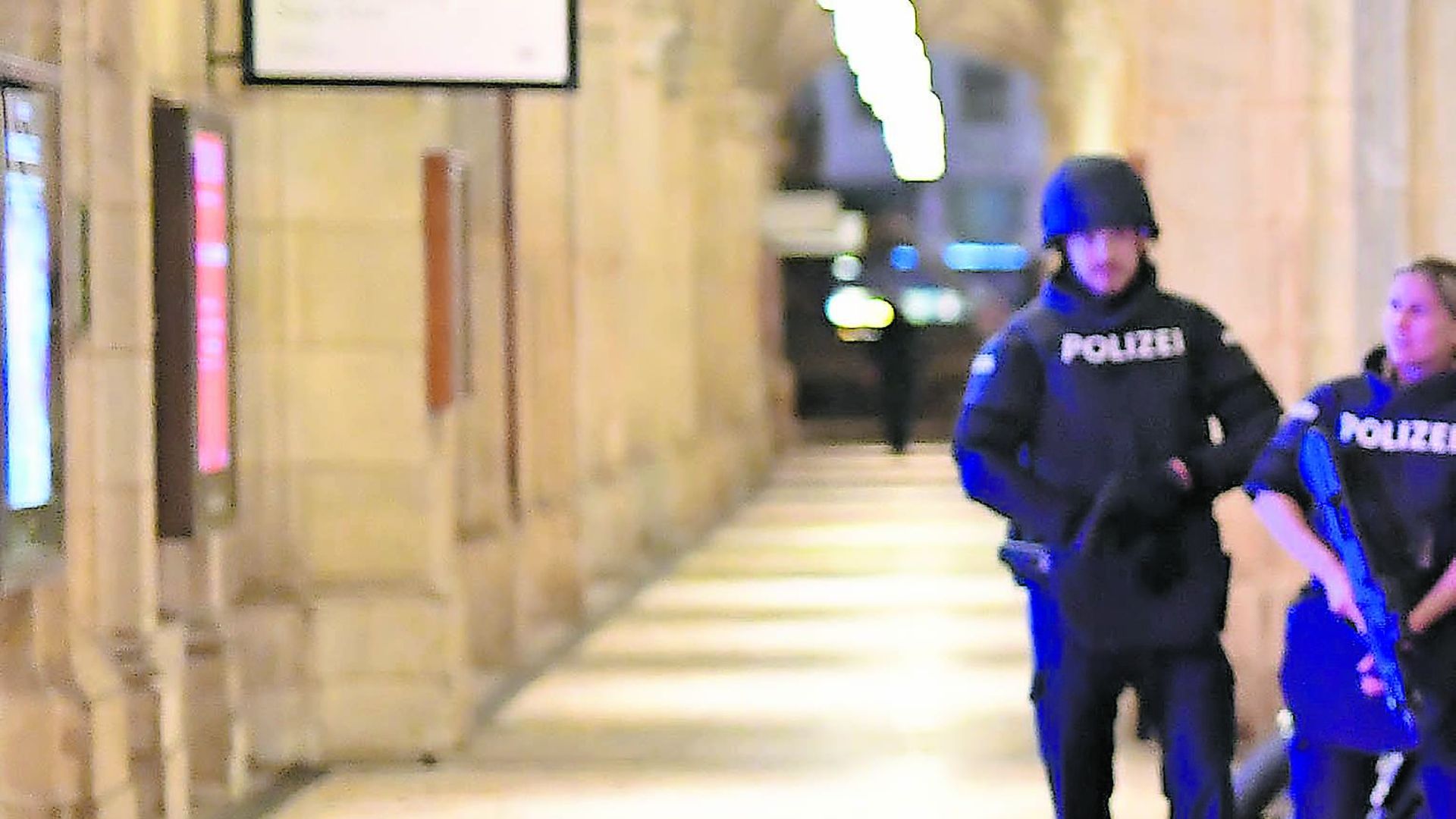 ALERT IN VIENNA: Armed police control a passage near the opera in central Vienna following a shooting near a synagogue - Credit: Getty Images